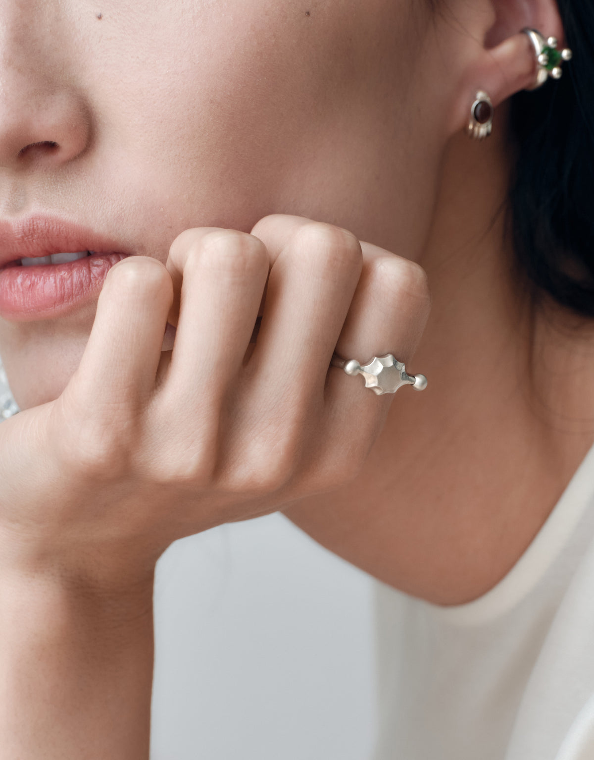 LAS Scallop Swivel Ring | Metal worn on the model, cast in sterling silver. Handmade in Los Angeles. LAS Scallop Swivel Ring | Metal by CLED.