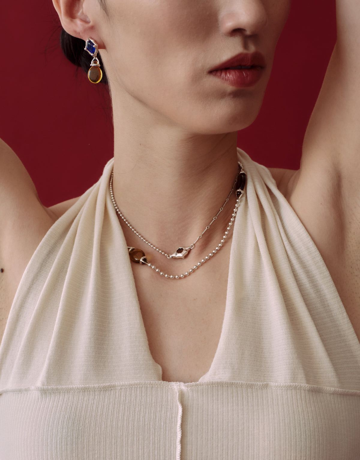 Interlace Necklace worn on the model, upcycled glass Eco Gem set in sterling silver. Handmade in Los Angeles. Interlace Necklace by CLED.