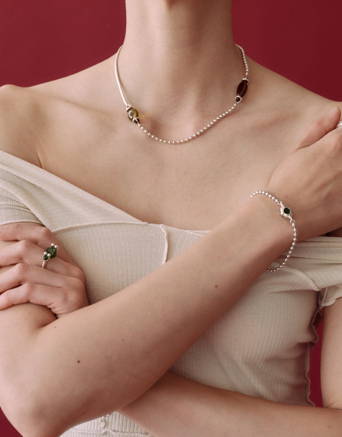 Picot Necklace worn on the model, upcycled glass Eco Gem set in sterling silver. Handmade in Los Angeles. Picot Necklace by CLED.