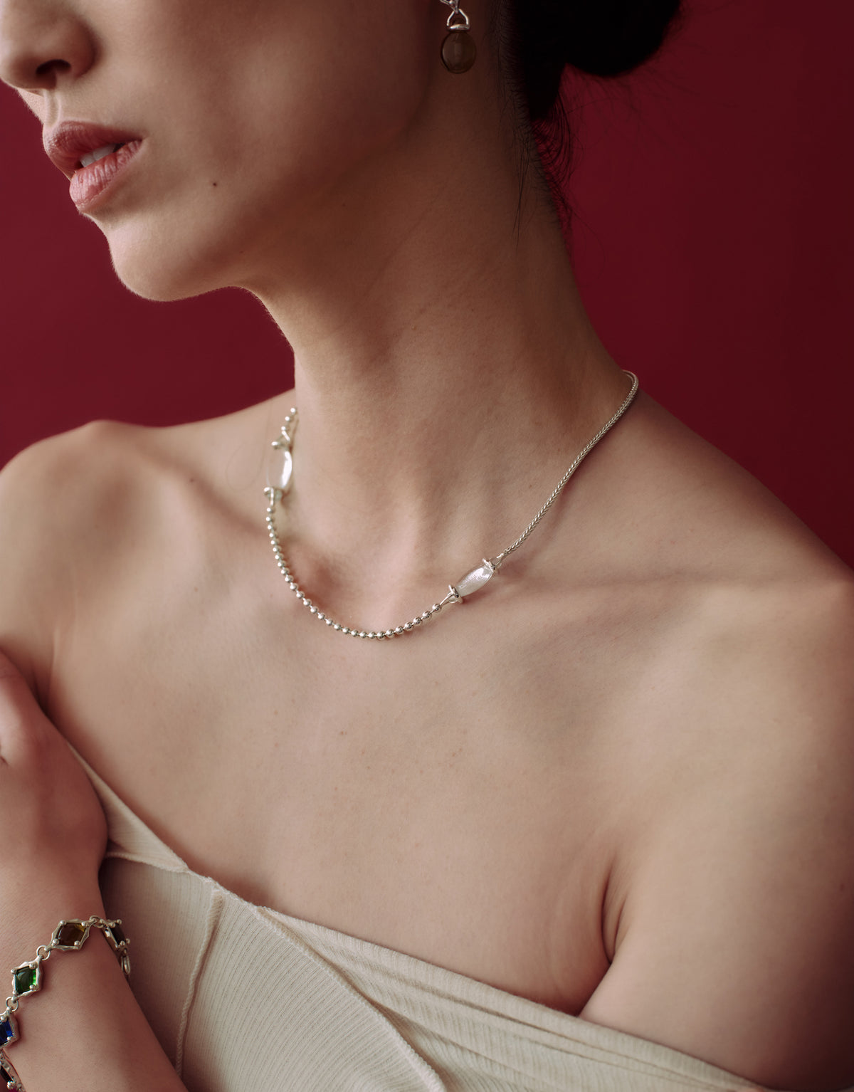 Picot Necklace worn on the model, upcycled glass Eco Gem set in sterling silver. Handmade in Los Angeles. Picot Necklace by CLED.