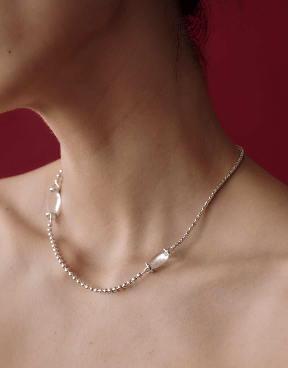 Picot Necklace worn on the model, upcycled glass Eco Gem set in sterling silver. Handmade in Los Angeles. Picot Necklace by CLED.