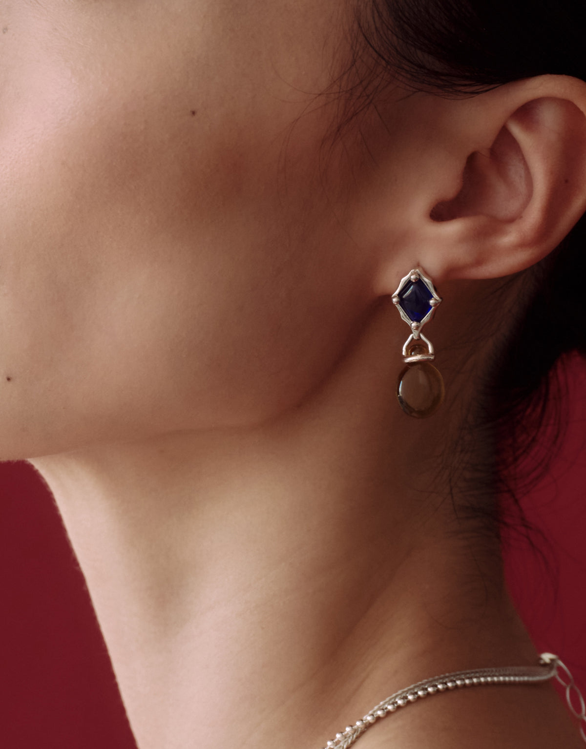 LAS Drop Earrings worn on the model, upcycled glass Eco Gem set in sterling silver. Handmade in Los Angeles. LAS Drop Earrings by CLED.
