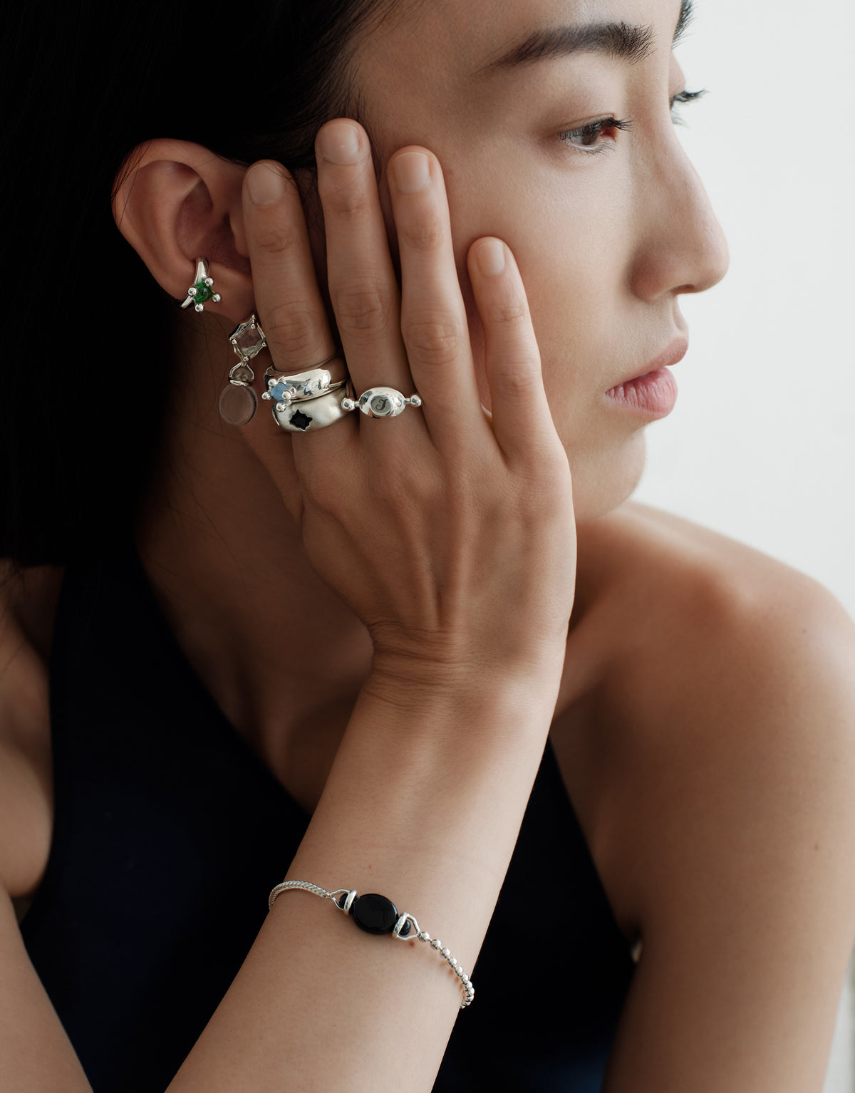 Picot Bracelet worn on the model, upcycled glass Eco Gem set in sterling silver. Handmade in Los Angeles. Picot Bracelet by CLED.