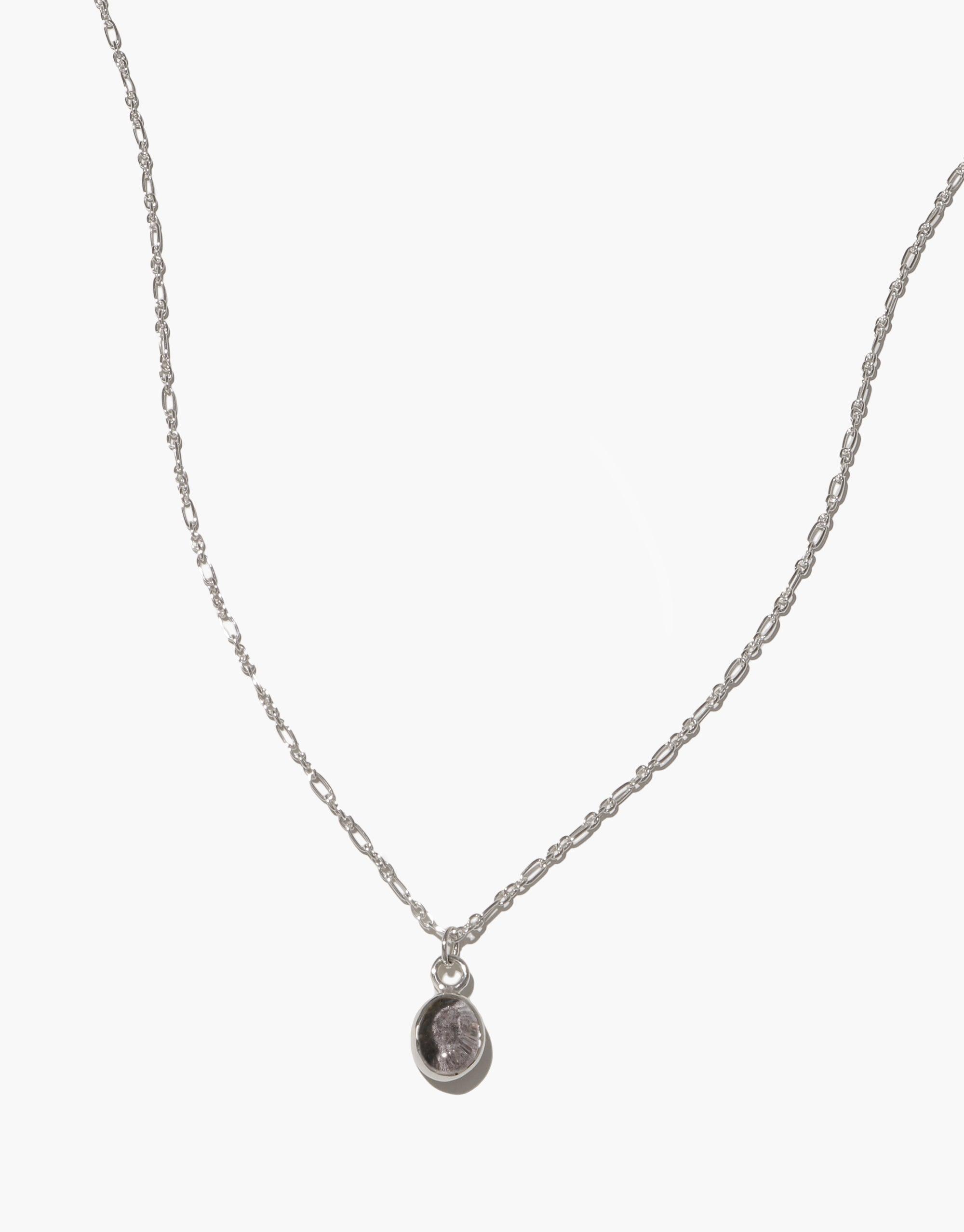 Delicate silver chain necklace with small oval charm pendant featuring upcycled eco glass, adjustable length, handmade in Los Angeles. Oval Charm Necklace by CLED