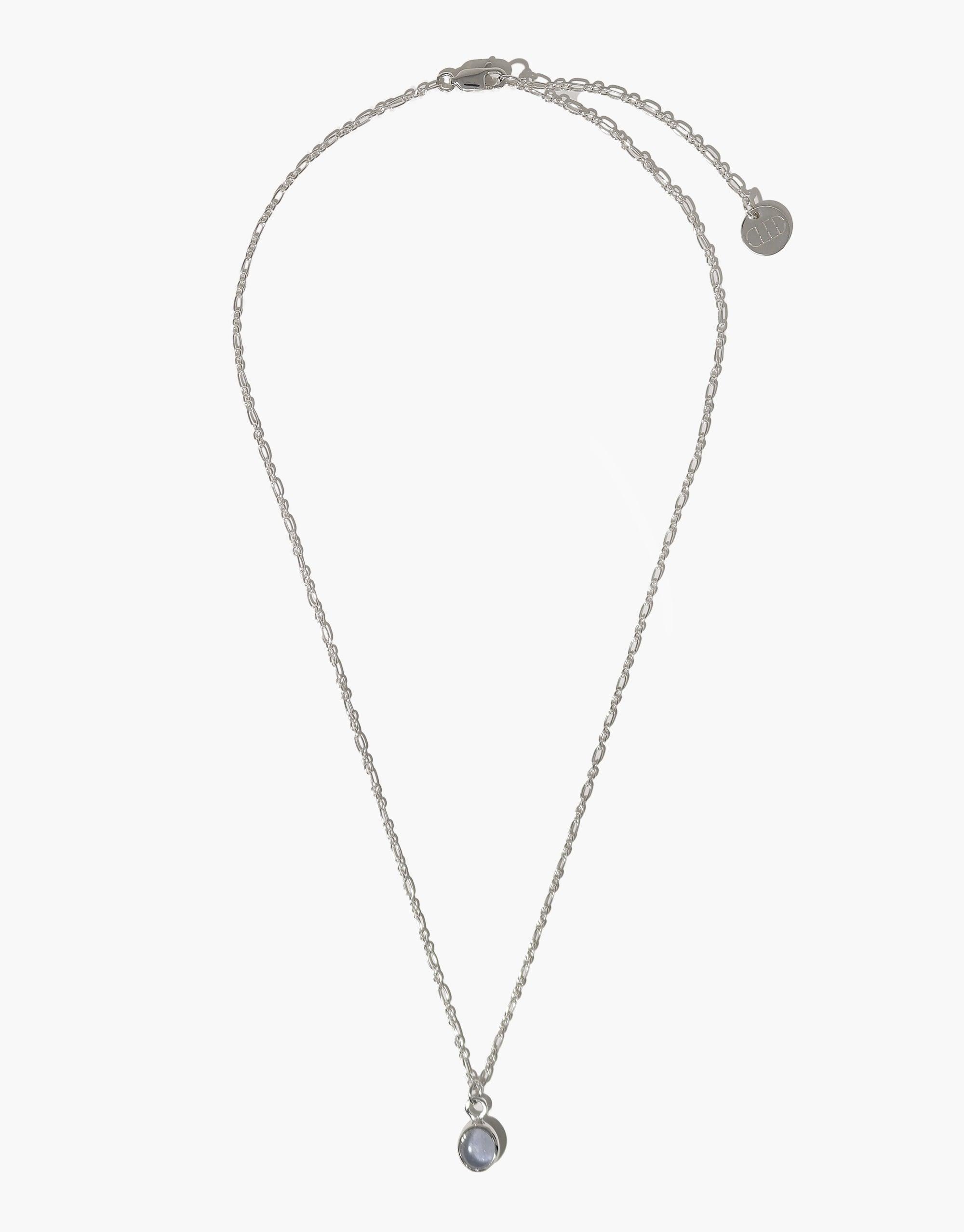 Elegant Oval Charm Necklace featuring delicate silver chain and pendant with upcycled eco gem charm. Adjustable length, handmade in Los Angeles. Sustainable jewelry piece by CLED.