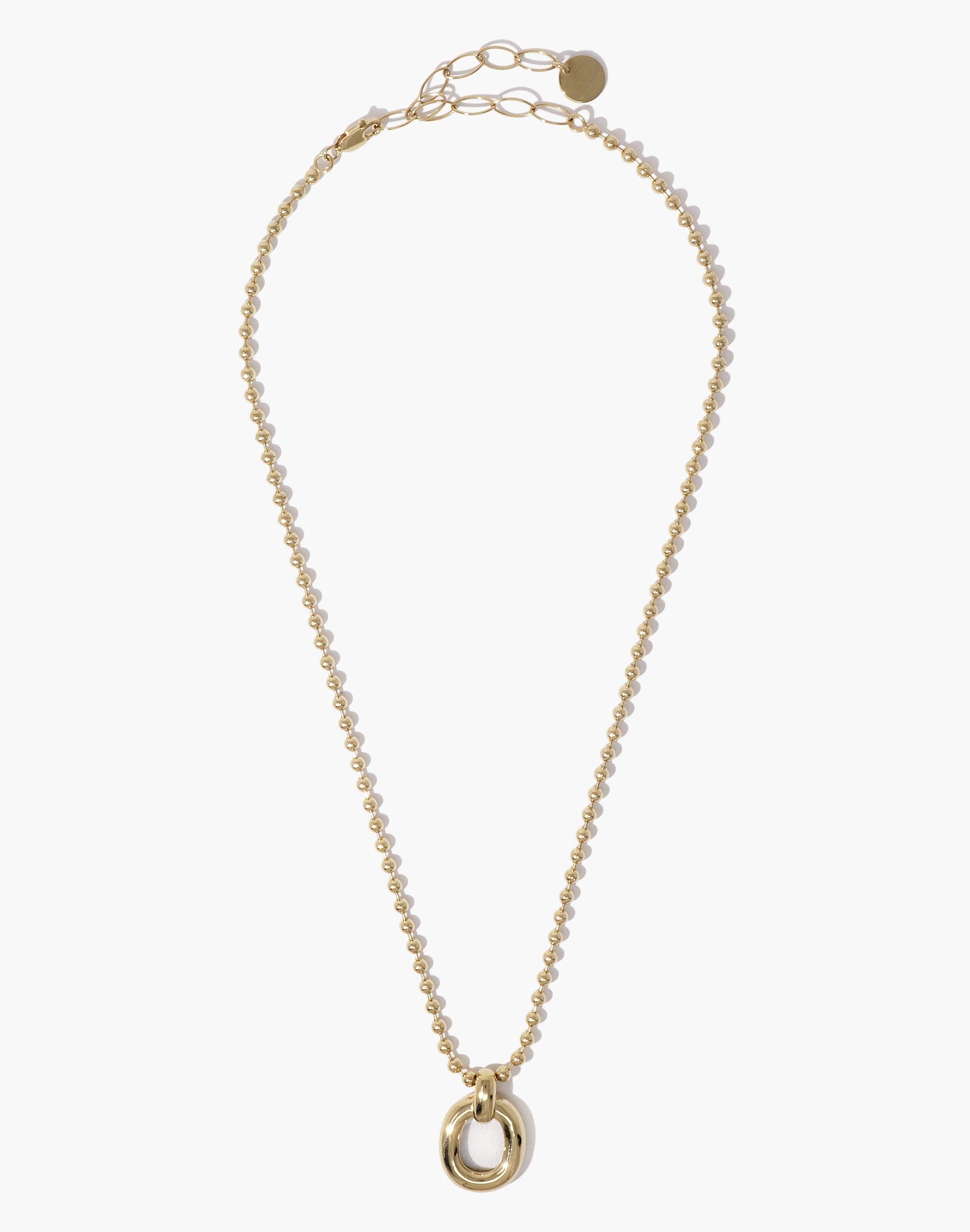 Elegant gold-toned ball chain necklace with circular pendant, showcasing minimalist design and adjustable clasp. Part of the Loop Collection, symbolizing unity and upcycling. Core Loop Necklace | Ball Chain by CLED