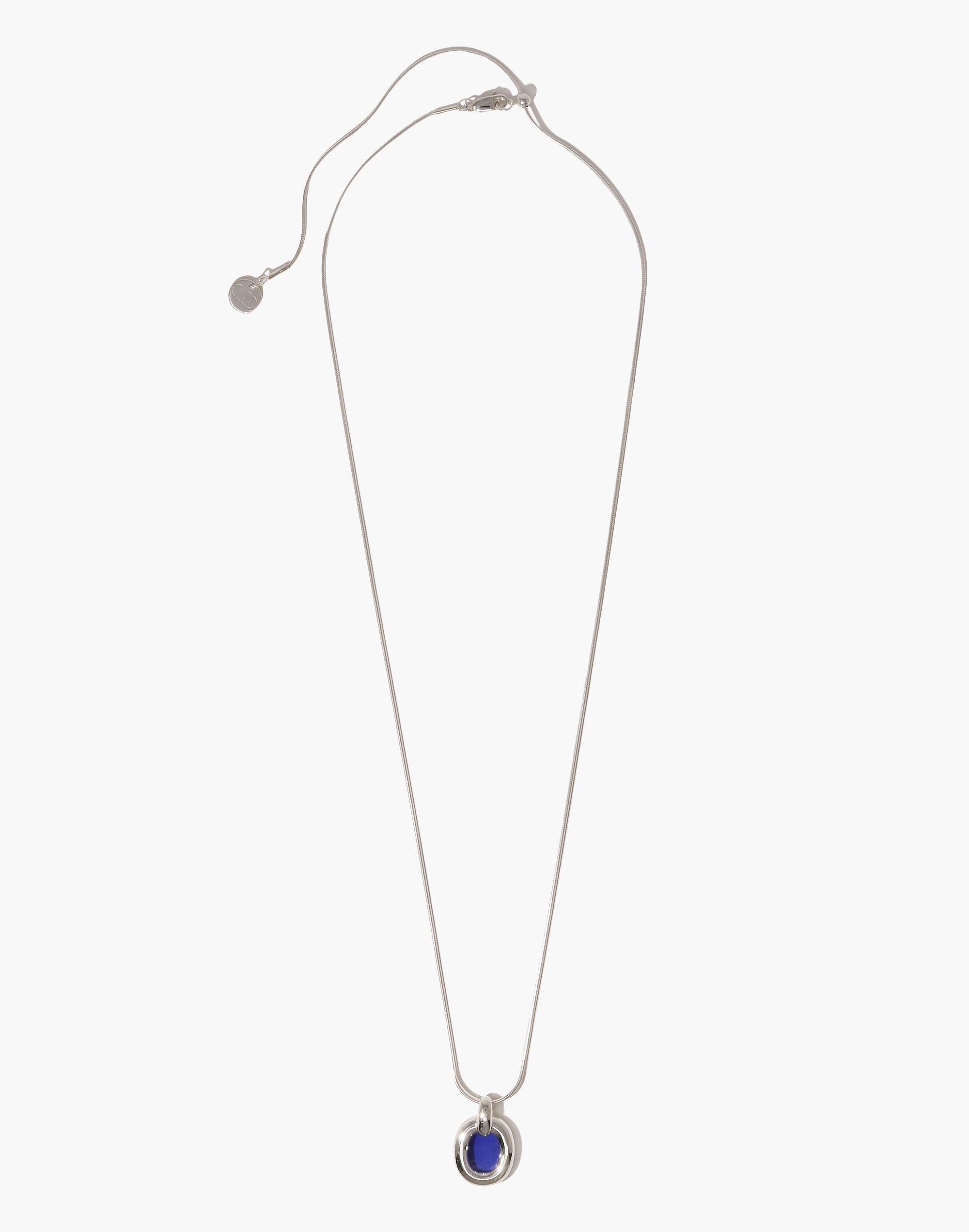 Elegant Core Loop Necklace featuring a delicate snake chain and a captivating blue pendant, symbolizing unity and upcycling. This versatile piece from the Loop Collection embodies connection and sustainability. Core Loop Necklace | Snake Chain by CLED.