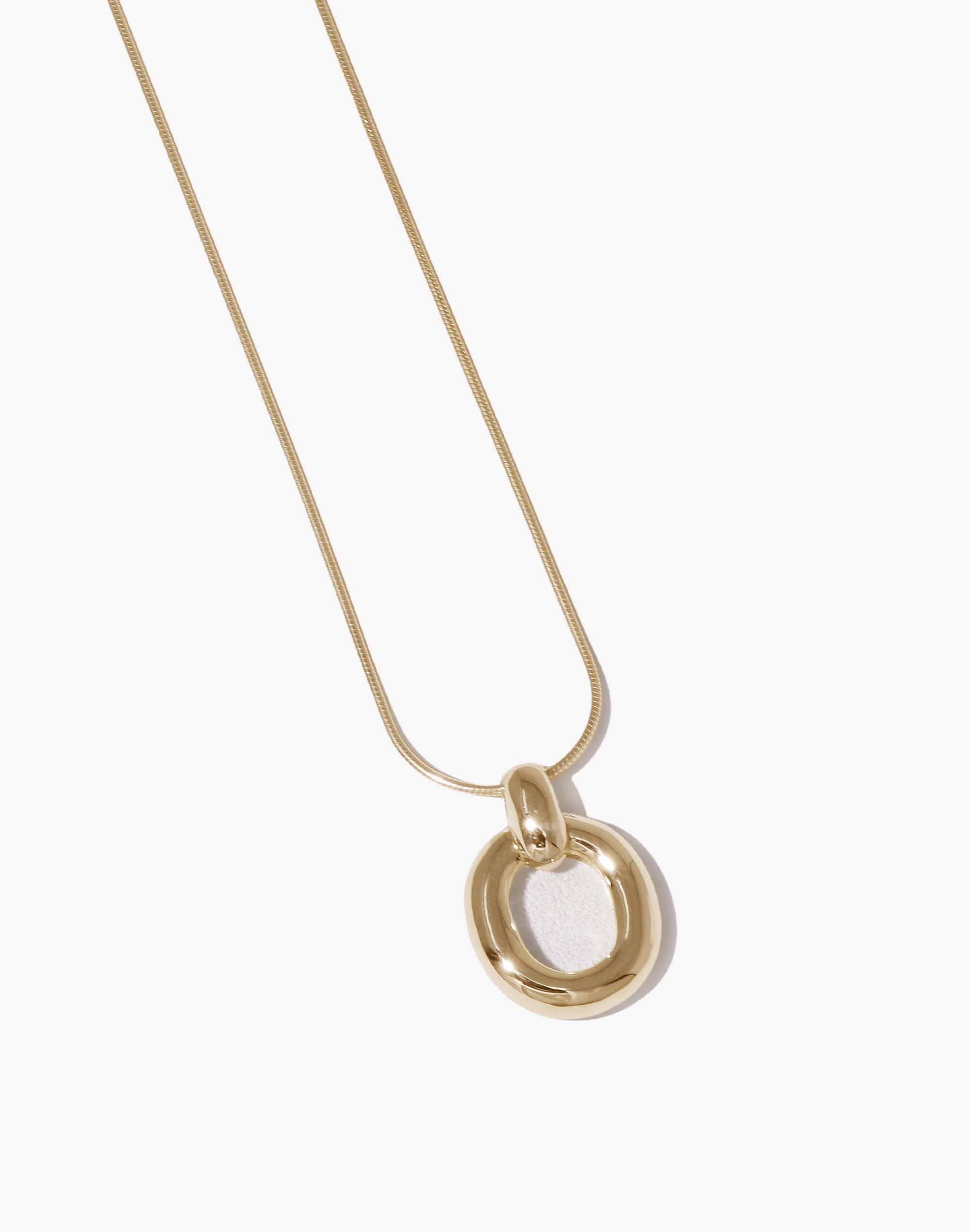 Elegant Core Loop Necklace featuring a gold-toned snake chain and circular pendant, symbolizing unity and sustainability. A stylish upcycled accessory from the In The Loop collection by CLED. Core Loop Necklace | Snake Chain
