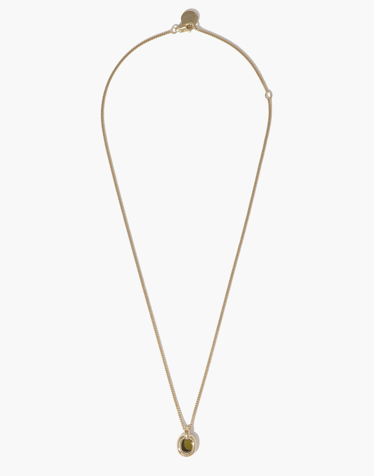 Elegant gold-toned Small Core Loop Necklace featuring a delicate chain and circular pendant, symbolizing unity and upcycling. This versatile piece from the Loop Collection showcases sustainable jewelry design, perfect for everyday wear. CLED Small Core Loop Necklace.