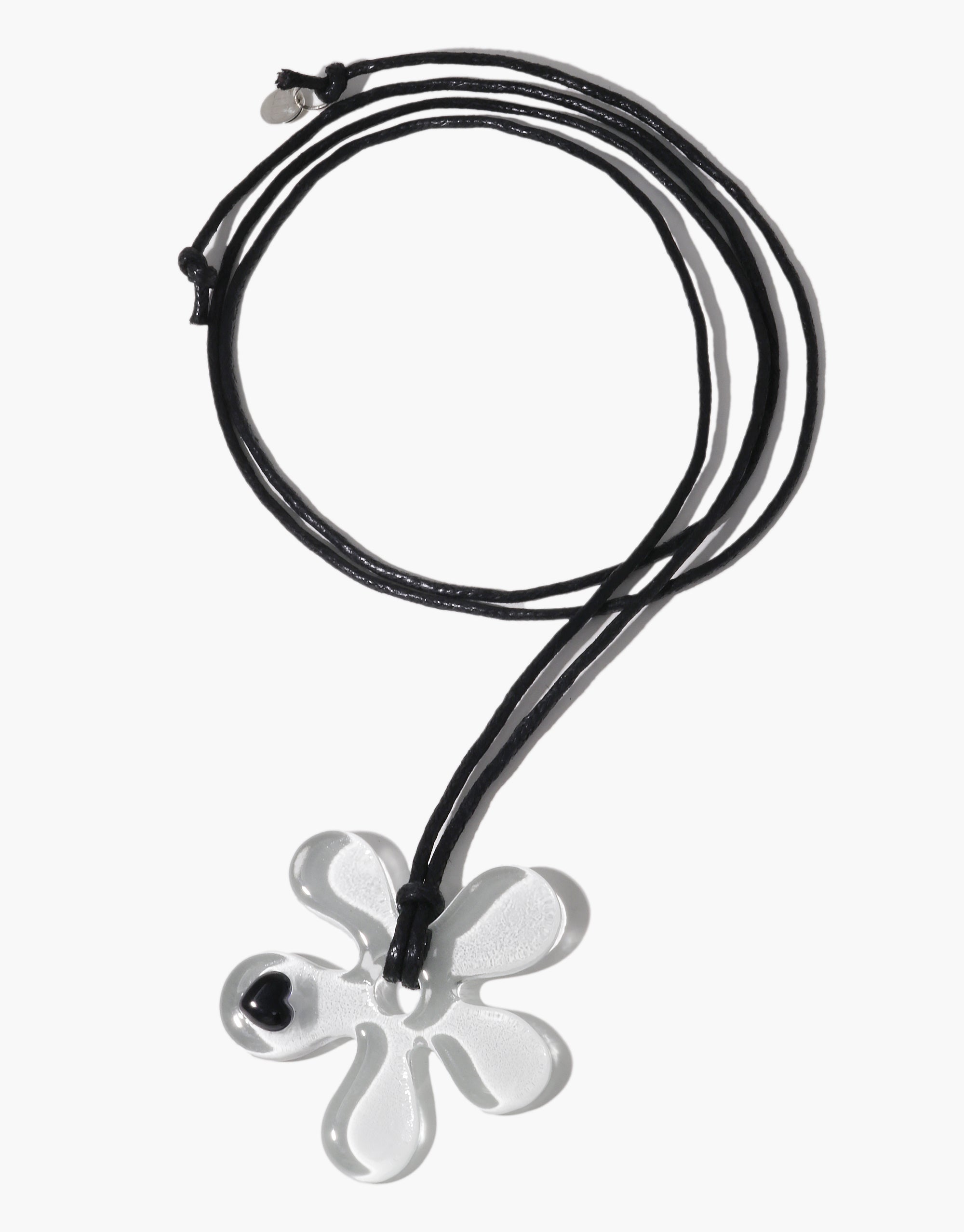 Petal Sculpture Necklace with clear glass flower pendant and heart detail on black adjustable cord - CLED