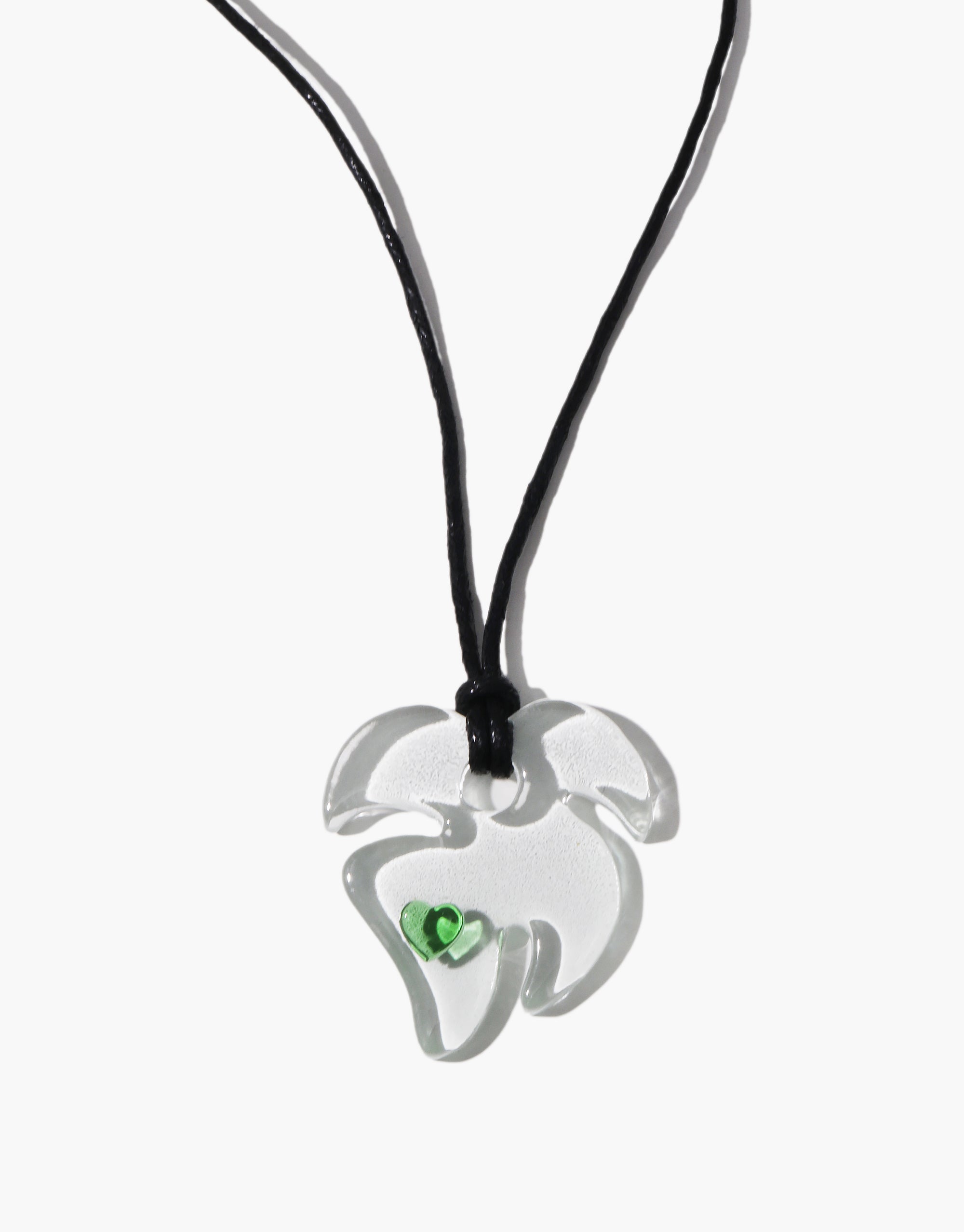 Hand-drawn glass Leaf Sculpture Necklace with green heart detail on black cord, minimalist nature-inspired design by CLED