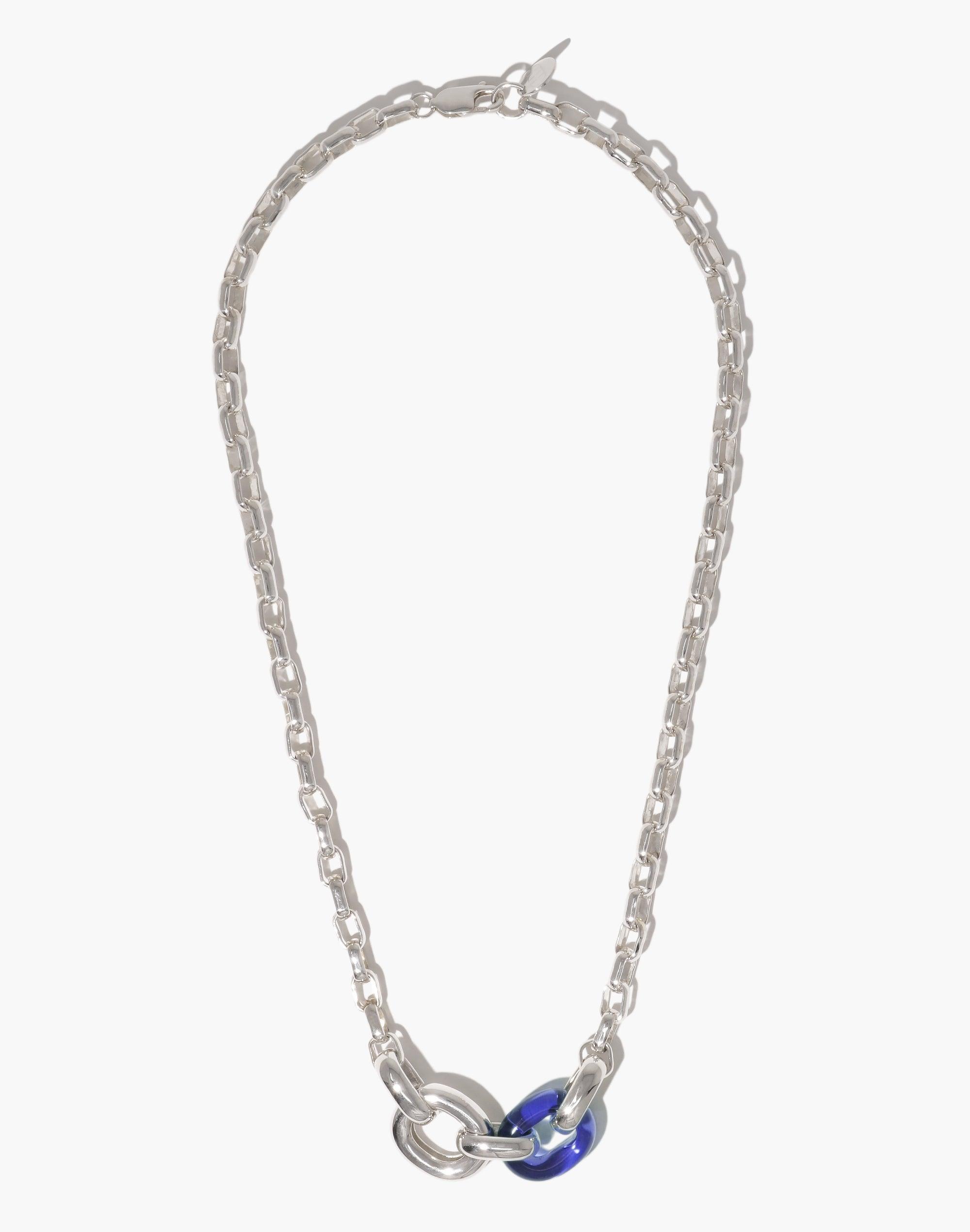 Elegant Loop Chain Necklace featuring a silver-toned chain with interconnected links, adorned with a unique blue accent piece, symbolizing unity and upcycled beauty. A versatile and sustainable accessory from the In The Loop collection by CLED.