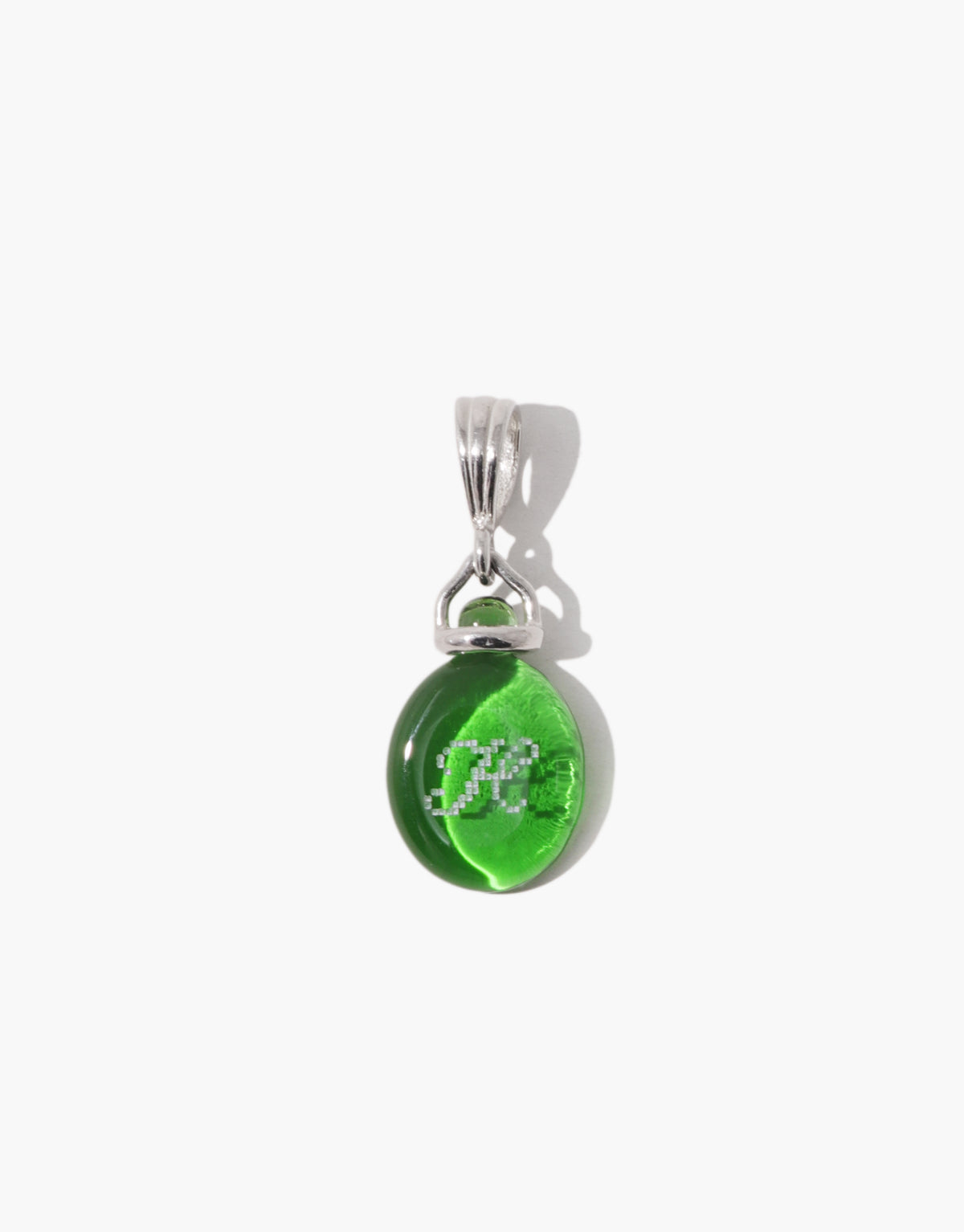 Las Pendant | Oval in the large size, a deep green forest glass Eco Gem on a slim sterling silver bail. Las Pendant | Oval by CLED.