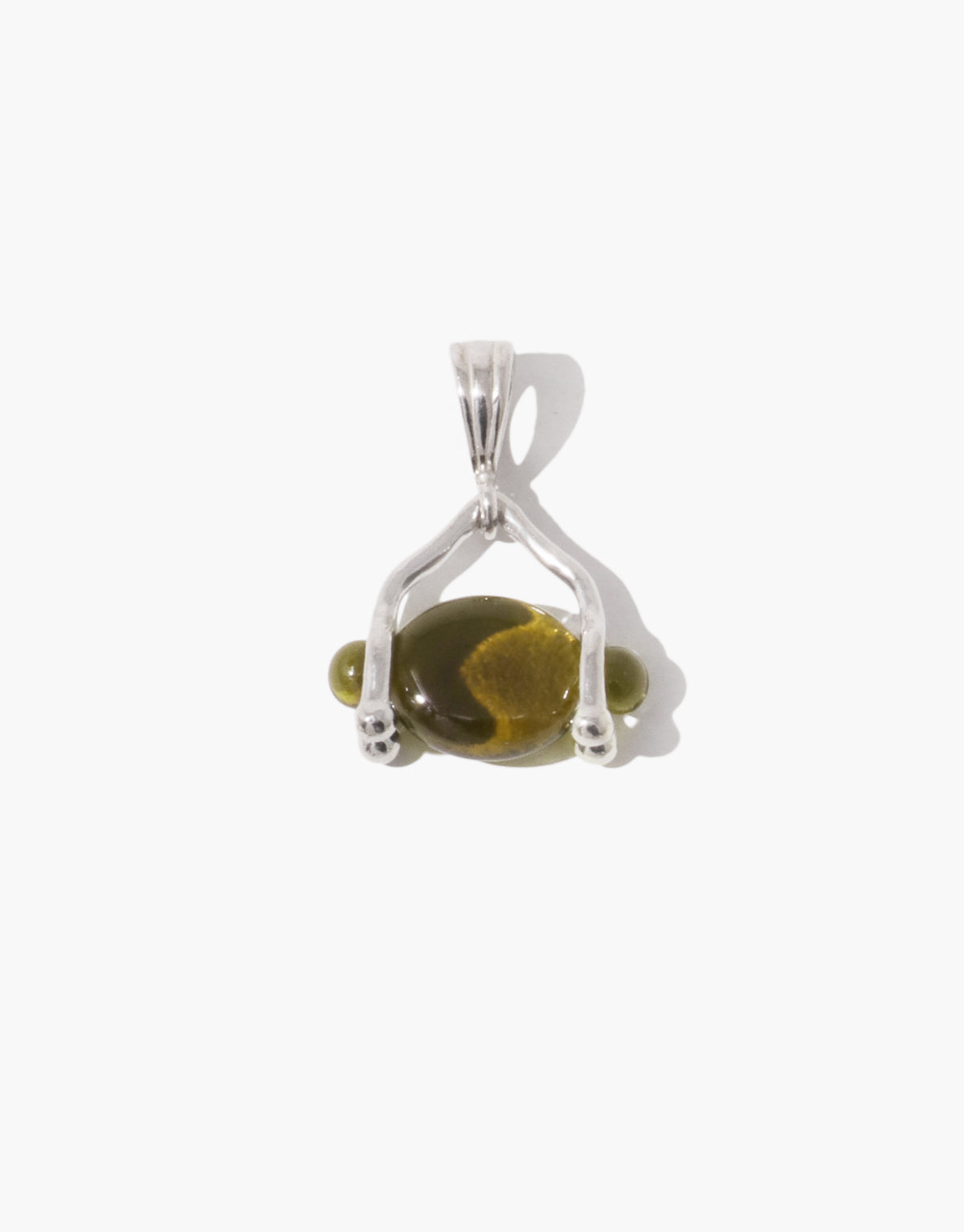 LAS Oval Swivel Pendant | Engraving in light olive glass, an upcycled Eco Gem set in a sterling silver swivel bail. Handmade in Los Angeles. LAS Oval Swivel Pendant | Engraving by CLED.