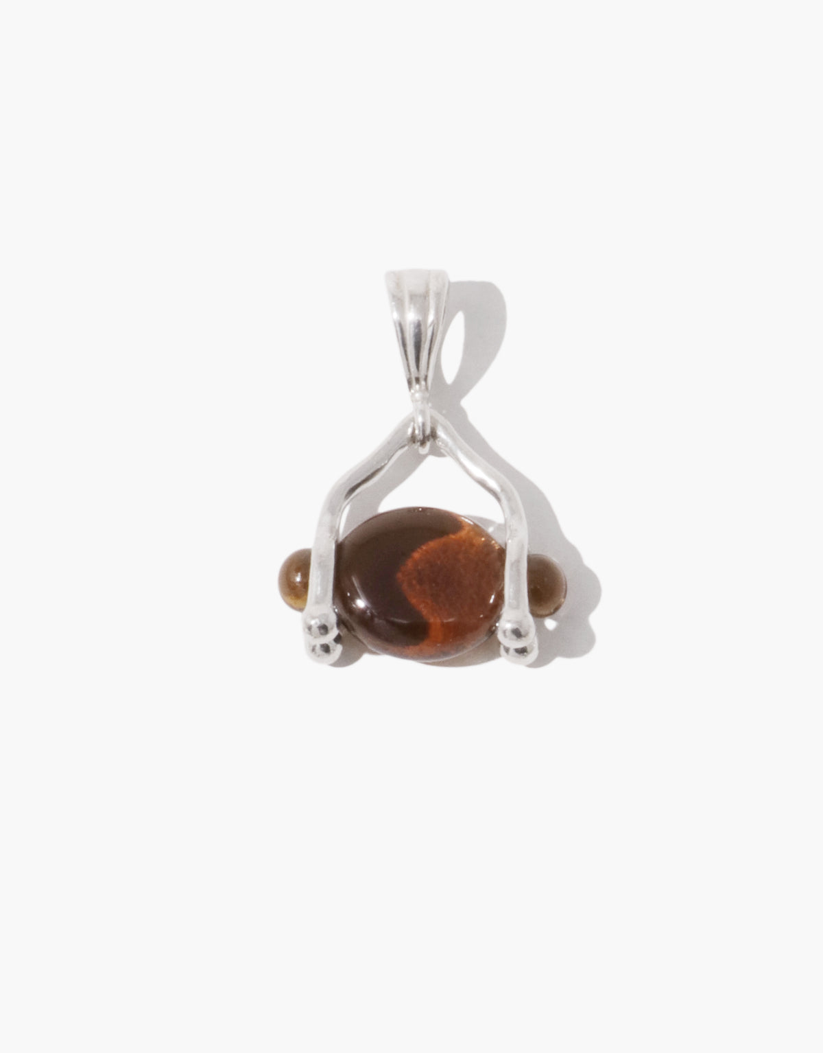 LAS Scallop Swivel Pendant in brown amber glass, an upcycled Eco Gem set in sterling silver. Handmade in Los Angeles. LAS Scallop Swivel Pendant by CLED.