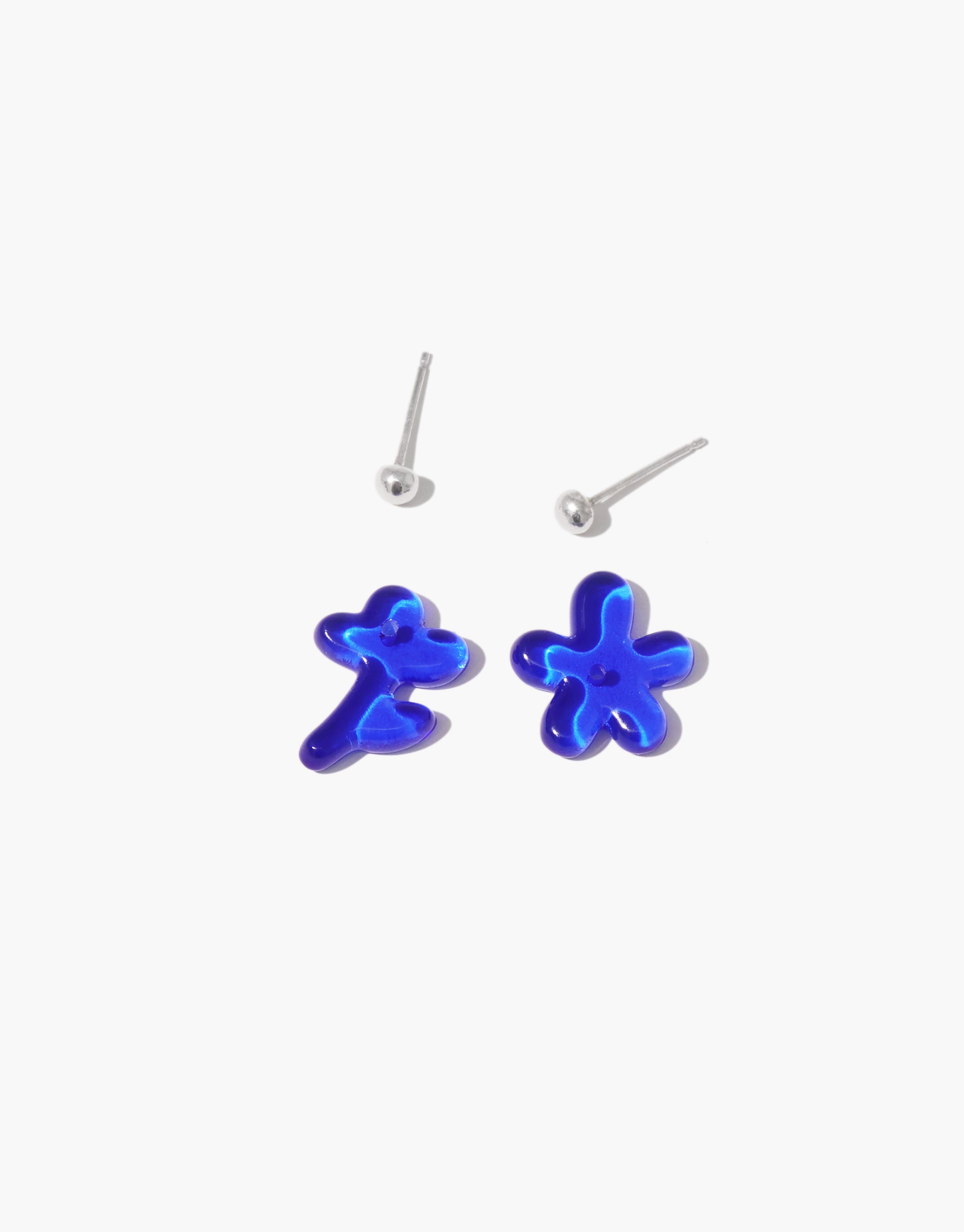 Petal Icon Stud Earrings featuring mismatched blue floral designs with removable silver posts - CLED