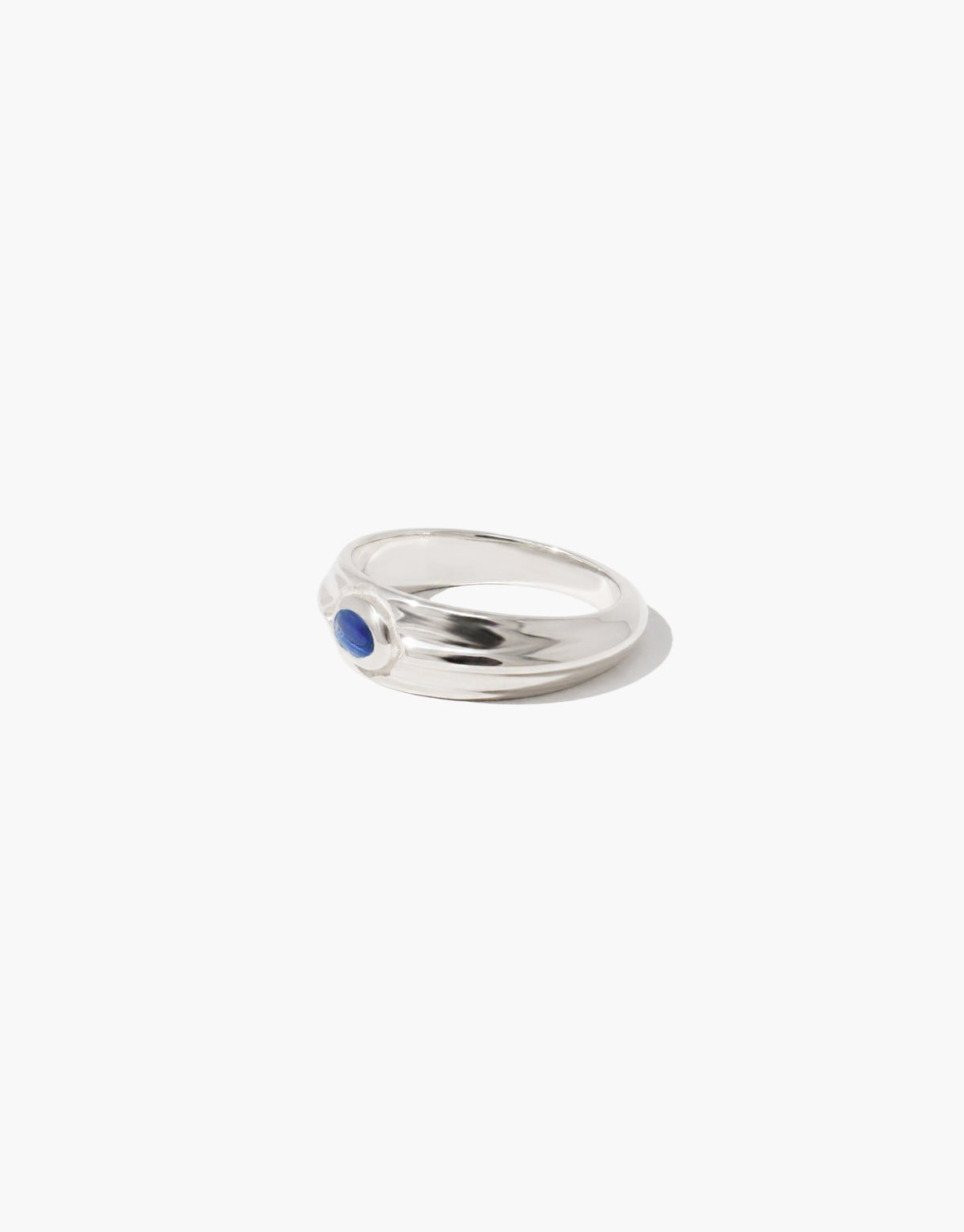 Eyelet Scallop Ring with a blue ocean glass Eco Gem framed by a scalloped silver eyelet on a grooved domed band. Eyelet Scallop Ring by CLED.