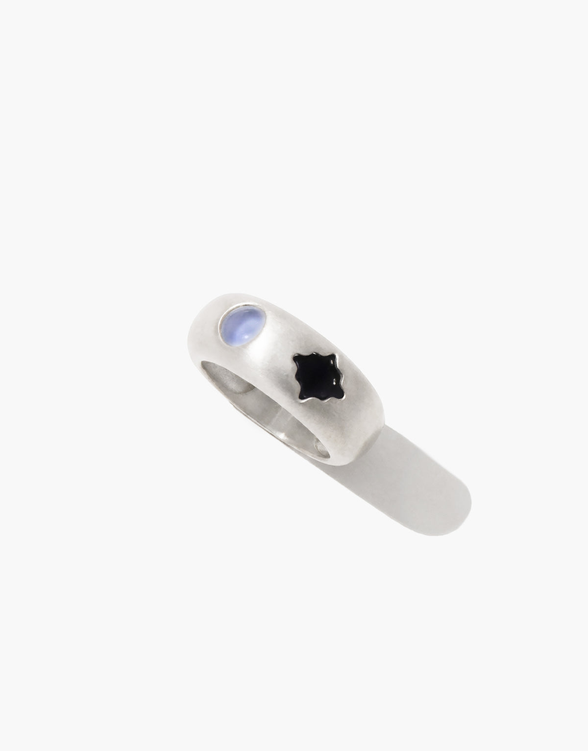 Close-up of the Las Duo Ring showing how each glass Eco Gem sits flush with the brushed sterling silver surface. Las Duo Ring by CLED.