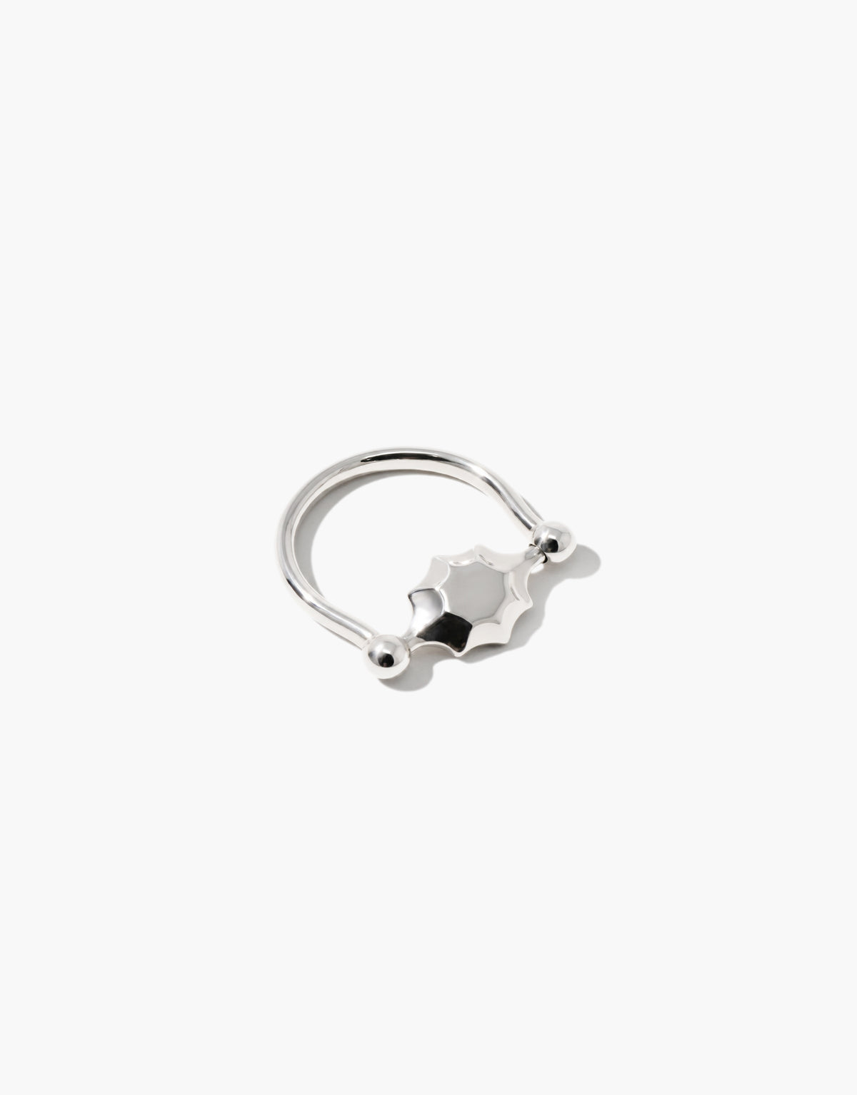 Las Swivel Ring | Scallop Metal cast entirely in polished sterling silver, the scalloped face pivoting between two beads. Las Swivel Ring | Scallop Metal by CLED.