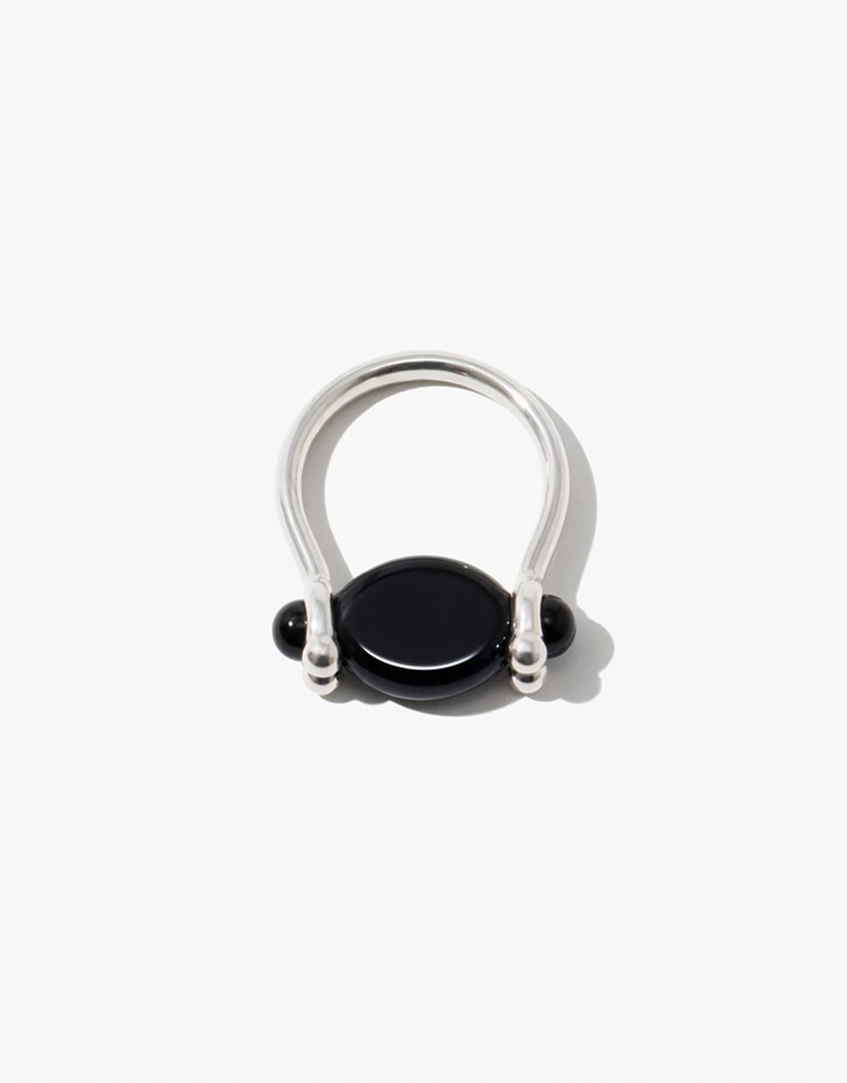 LAS Oval Swivel Ring in black basalt glass, an upcycled Eco Gem set in sterling silver. Handmade in Los Angeles. LAS Oval Swivel Ring by CLED.