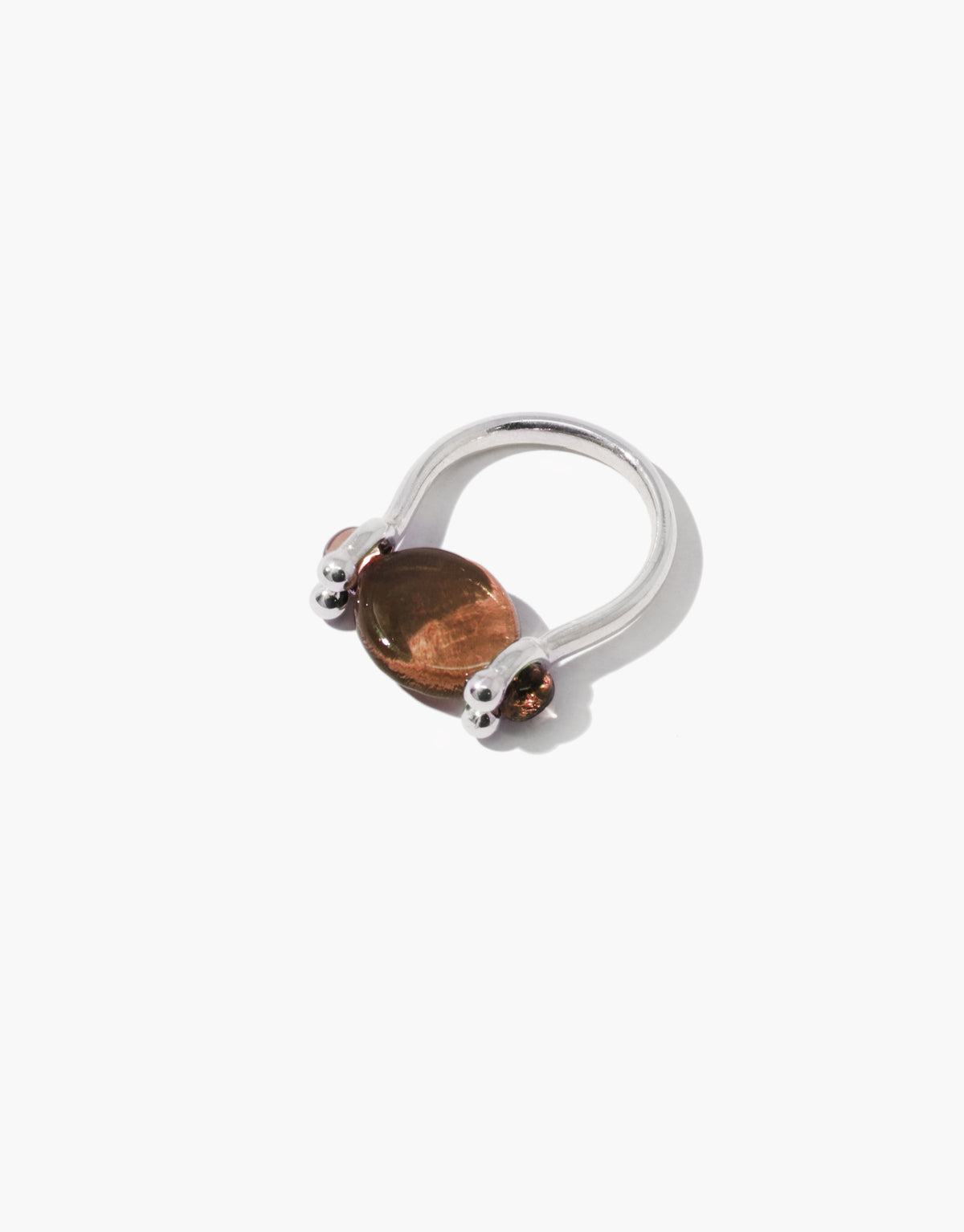 LAS Oval Swivel Ring in brown amber glass, an upcycled Eco Gem set in sterling silver. Handmade in Los Angeles. LAS Oval Swivel Ring by CLED.