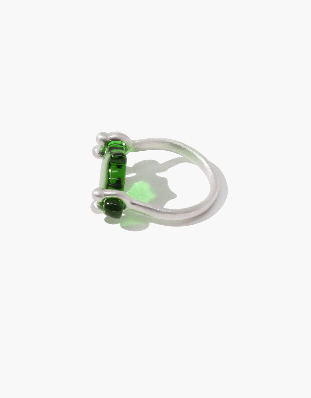 LAS Scallop Swivel Ring in green forest glass, an upcycled Eco Gem set in sterling silver. Handmade in Los Angeles. LAS Scallop Swivel Ring by CLED.