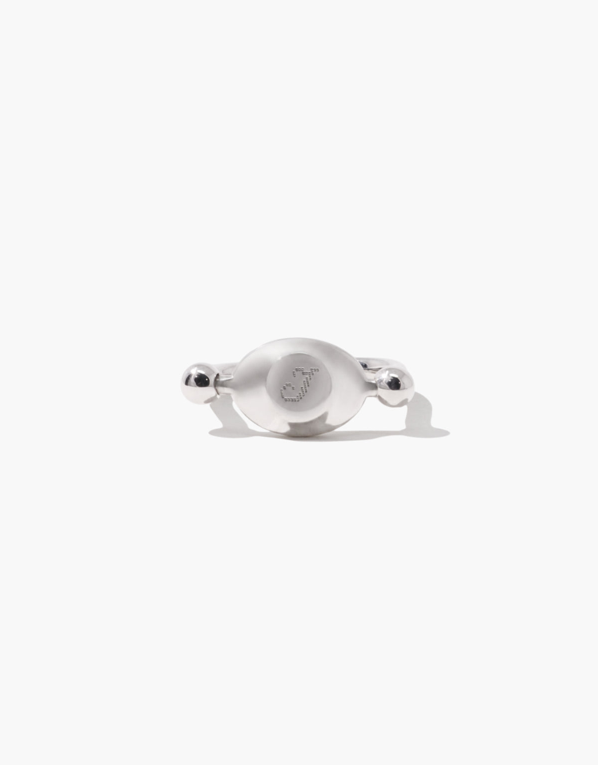 LAS Oval Swivel Ring | Metal cast in sterling silver, the smooth form turning between two beads. Handmade in Los Angeles. LAS Oval Swivel Ring | Metal by CLED.