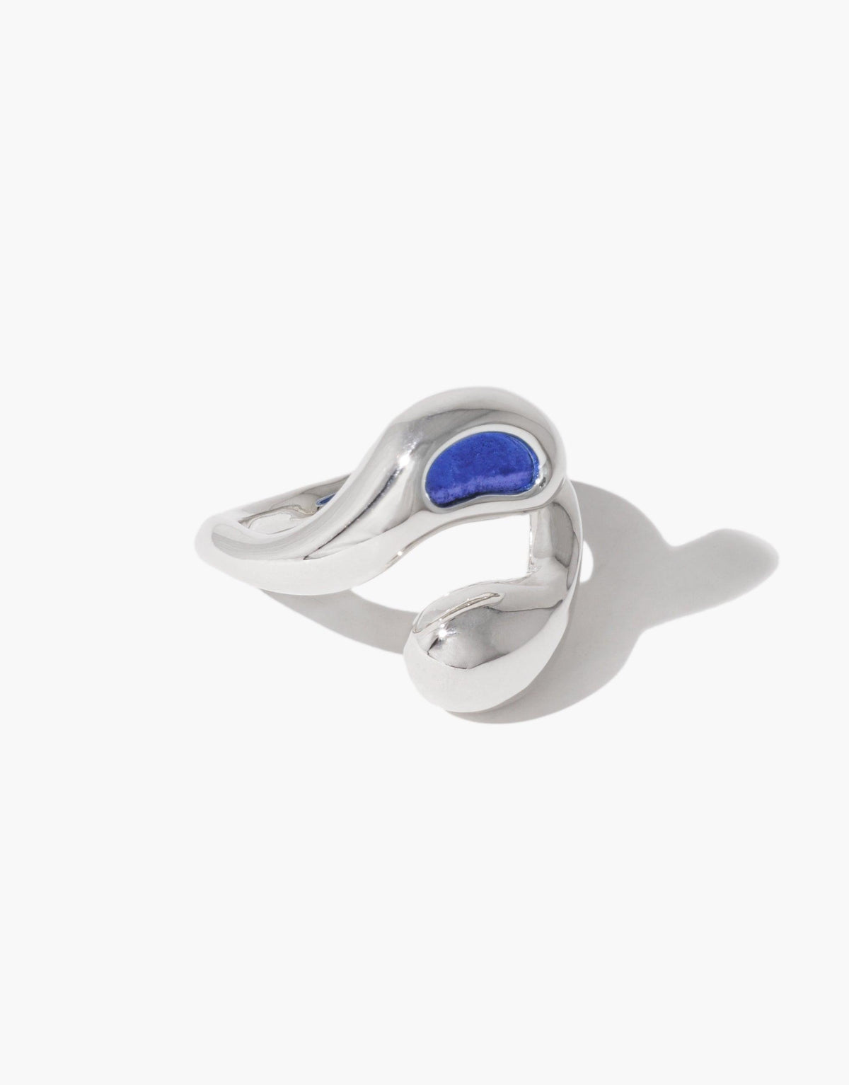 Sprout Ring featuring a silver band with a blue stone, inspired by nature's organic pea shapes and crafted from repurposed materials, reflecting growth and transformation.