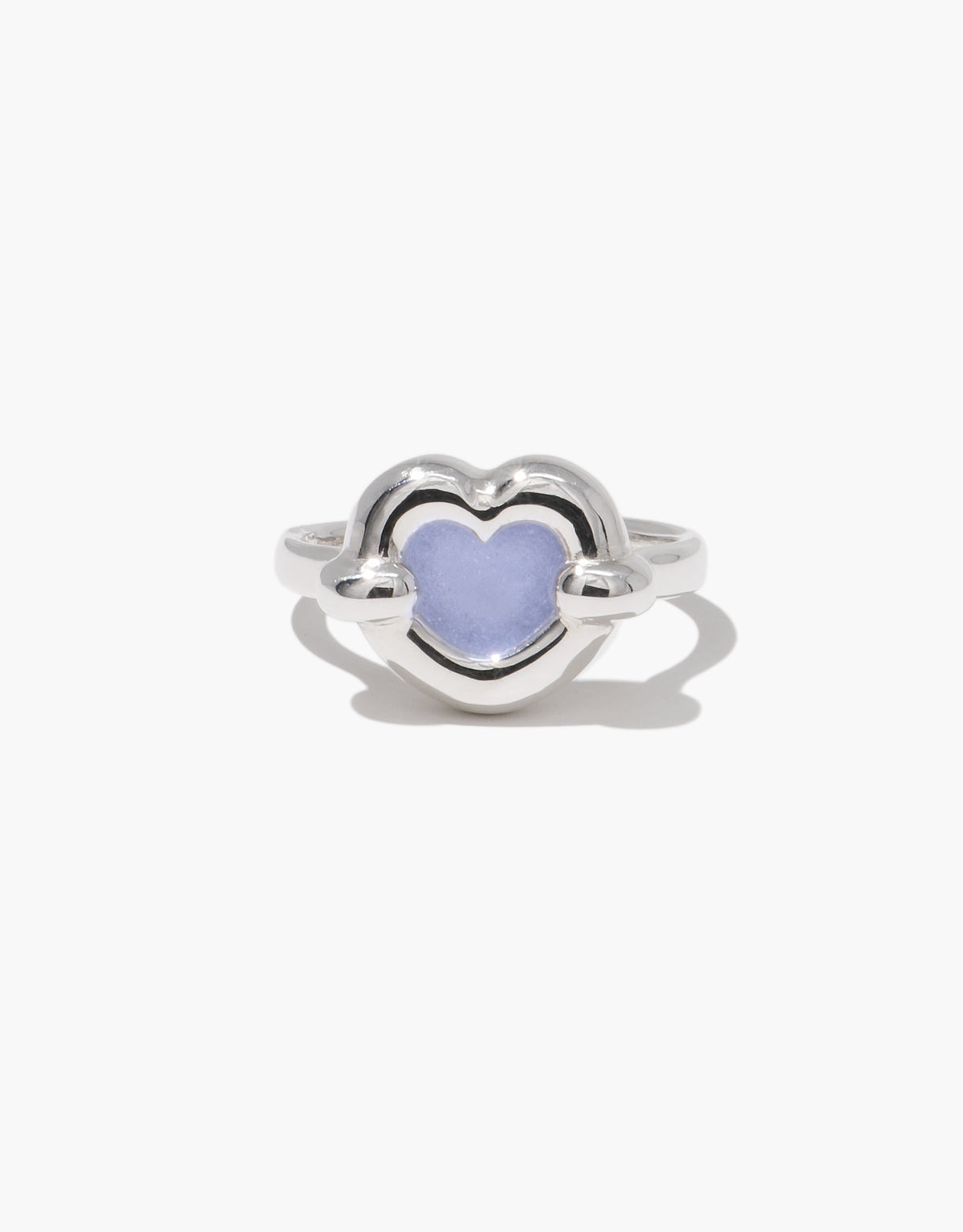 Core Heart Ring | Small: A silver ring featuring a light blue heart, showcasing a seamless, sculptural design. Minimal yet bold, this eco-conscious piece from CLED adds a modern touch to any outfit.