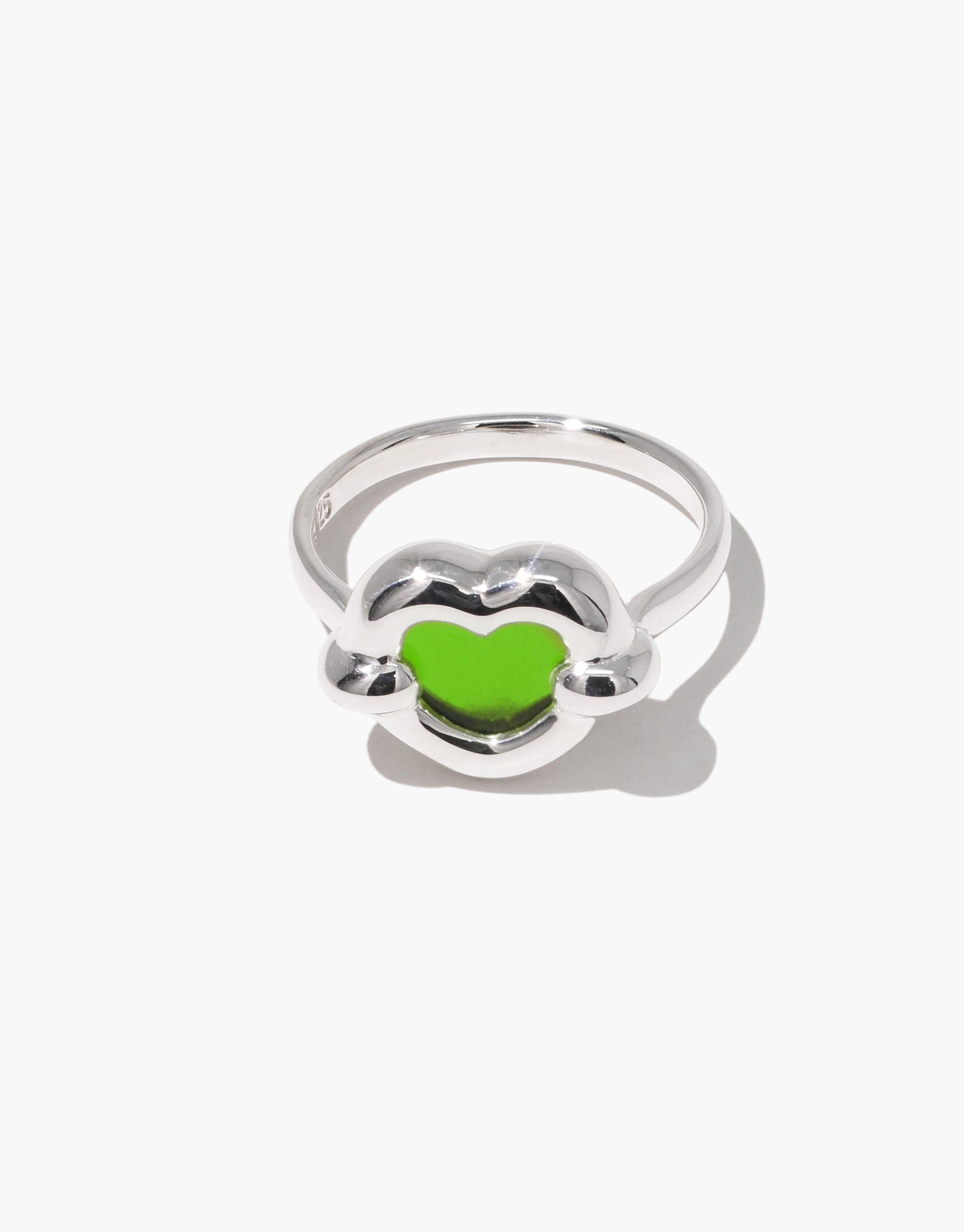 Core Heart Ring | Small: A silver ring featuring a green heart, showcasing a seamless, sculptural design. Minimal yet bold, this eco-conscious piece from CLED adds a modern touch to any outfit.