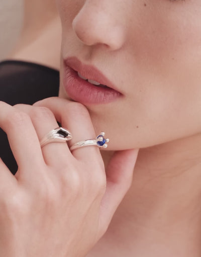 Fluted Ring in motion, worn on the model. Upcycled glass Eco Gems in sterling silver, handmade in Los Angeles. Fluted Ring by CLED.