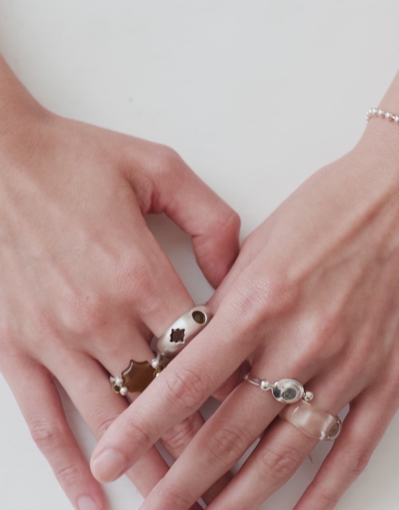 LAS Duo Ring shown in motion, two upcycled glass Eco Gems set side by side in sterling silver. Handmade in Los Angeles. LAS Duo Ring by CLED.