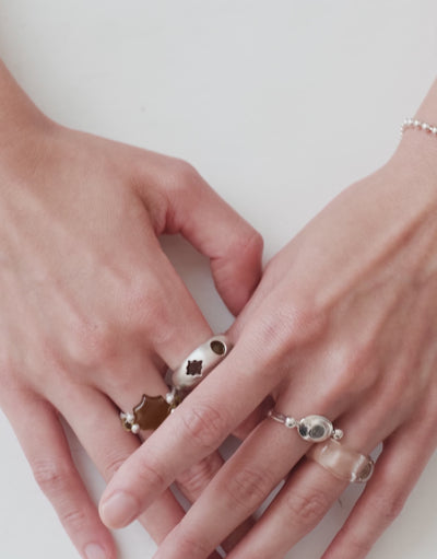 LAS Duo Ring shown in motion, two upcycled glass Eco Gems set side by side in sterling silver. Handmade in Los Angeles. LAS Duo Ring by CLED.