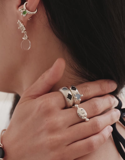 LAS Duo Ring in motion, worn on the model. Upcycled glass Eco Gems in sterling silver, handmade in Los Angeles. LAS Duo Ring by CLED.