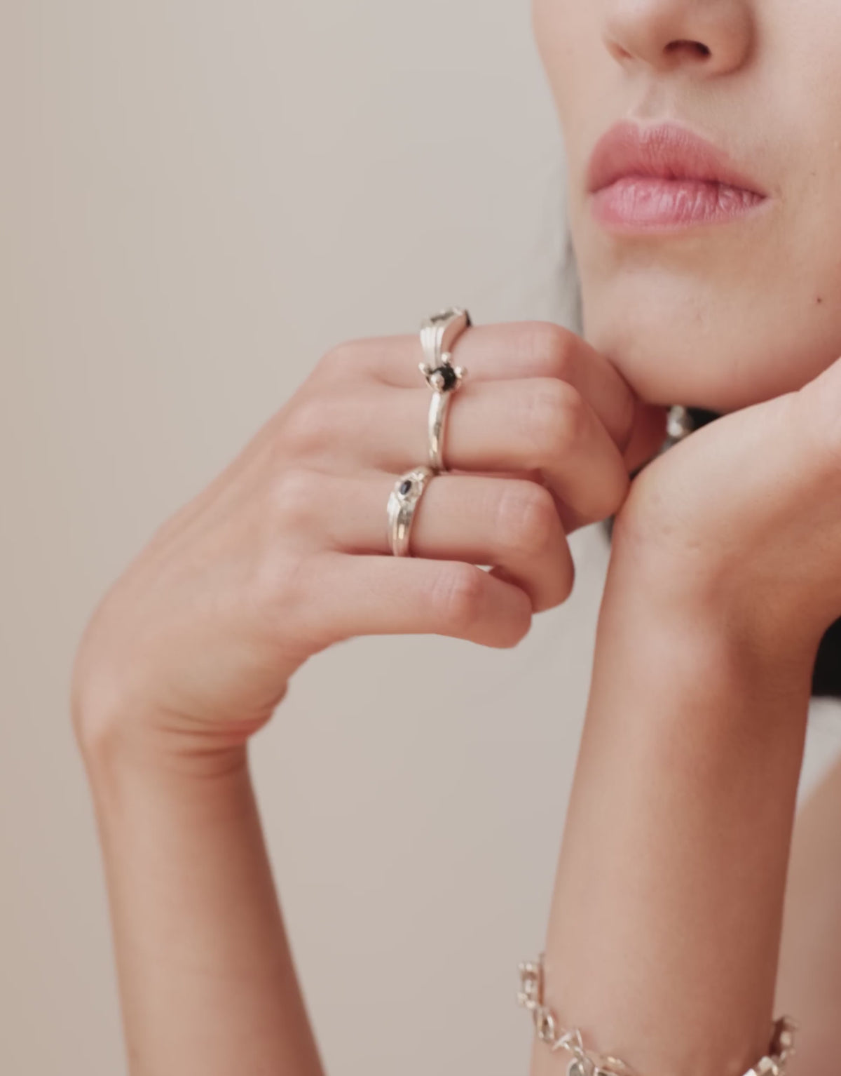 Eyelet Scallop Ring in motion, worn on the model. Upcycled glass Eco Gems in sterling silver, handmade in Los Angeles. Eyelet Scallop Ring by CLED.