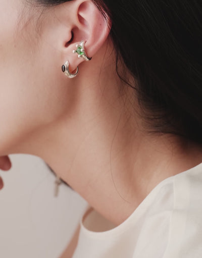 Scallop Hoop Earrings in motion, worn on the model. Upcycled glass Eco Gems in sterling silver, handmade in Los Angeles. Scallop Hoop Earrings by CLED.
