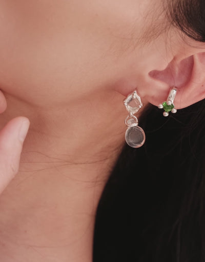 Picot Ear Cuff in motion, worn on the model. Upcycled glass Eco Gems in sterling silver, handmade in Los Angeles. Picot Ear Cuff by CLED.