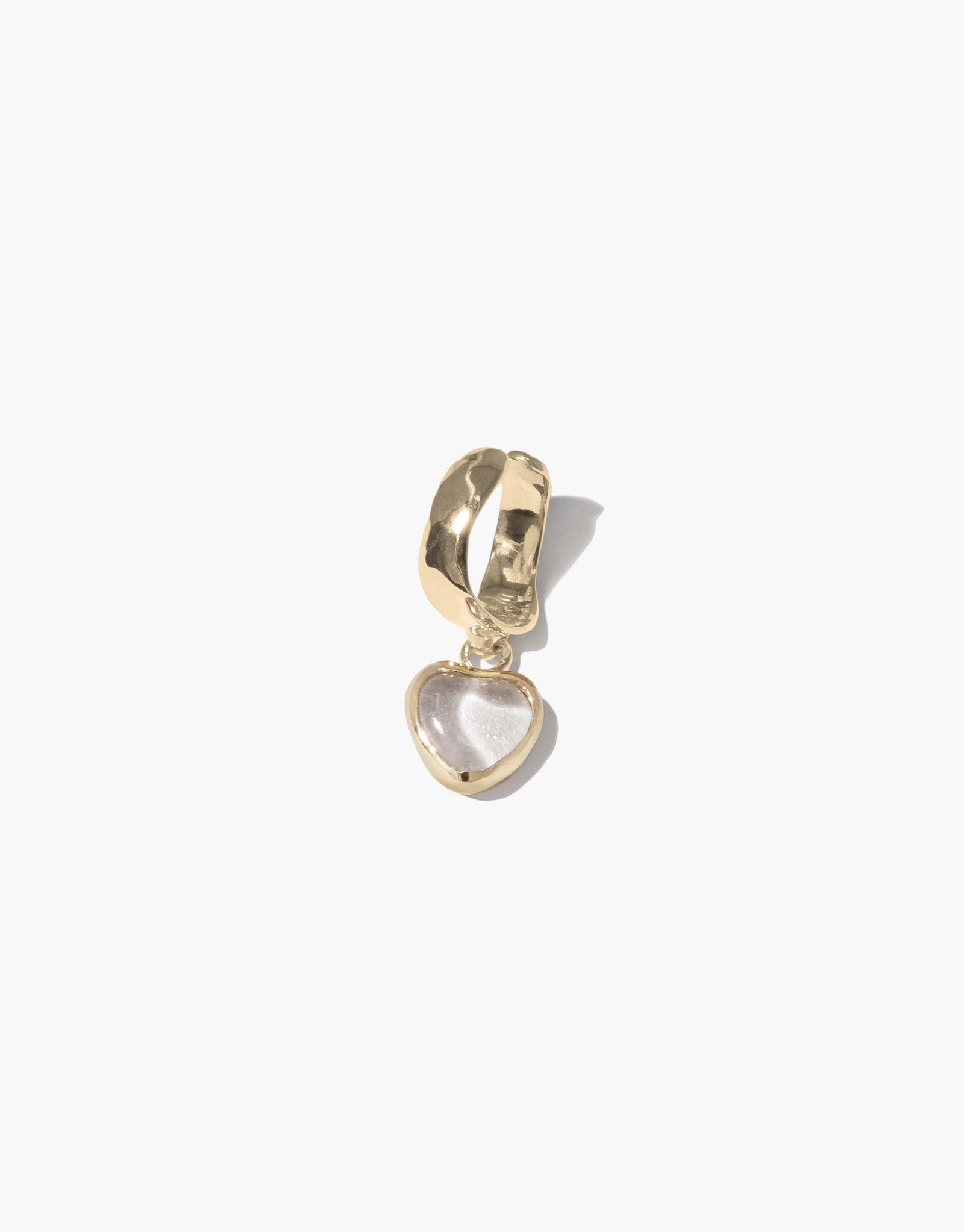 Gold ear cuff with delicate heart-shaped charm featuring upcycled glass, showcasing handcrafted elegance and sustainable design. Heart Dangling Ear Cuff by CLED
