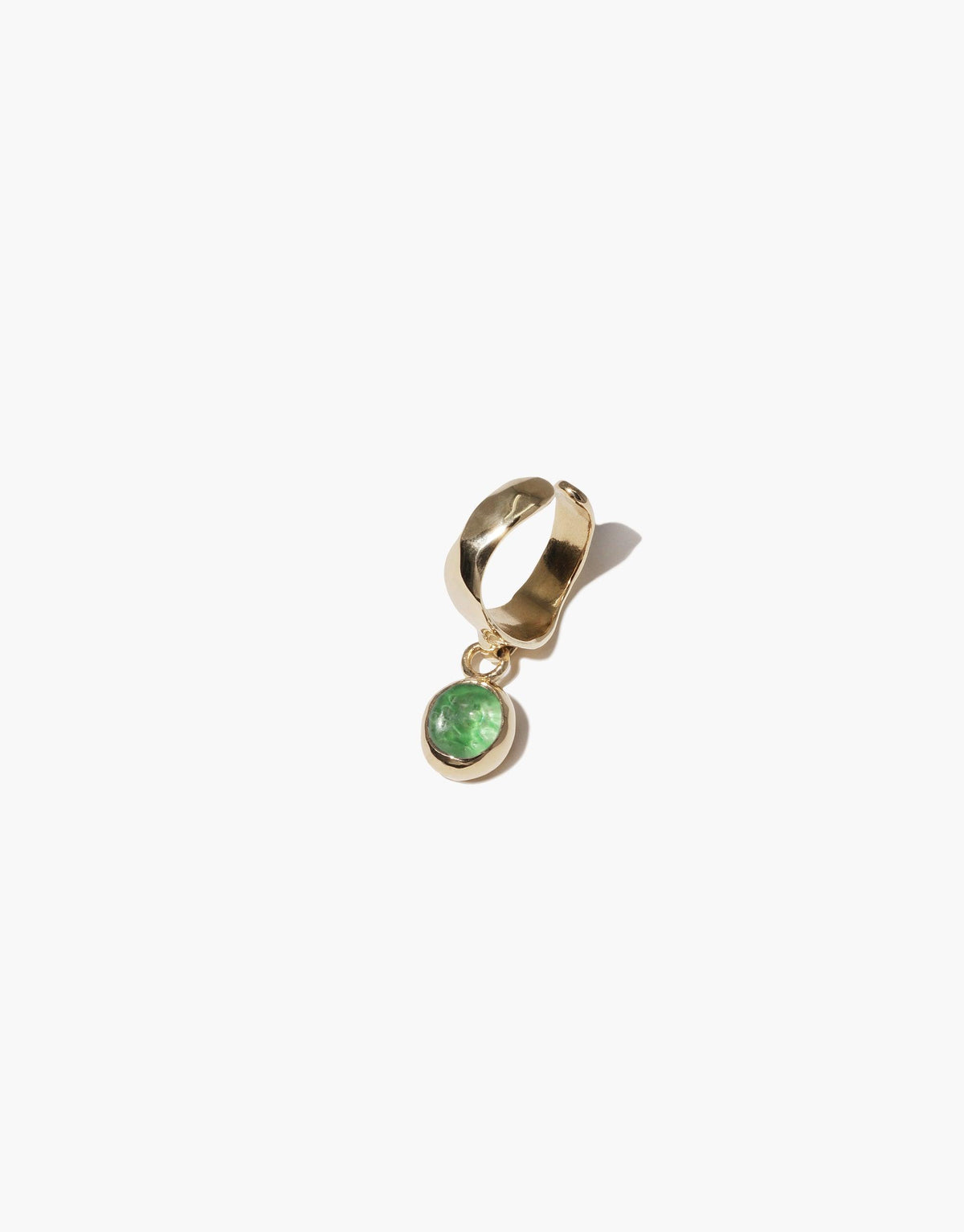 Oval Dangling Ear Cuff with gold-toned metal and green eco-friendly charm, featuring a unique curved design and sustainable upcycled glass dangle. Handcrafted jewelry piece showcasing elegance and environmental consciousness. CLED