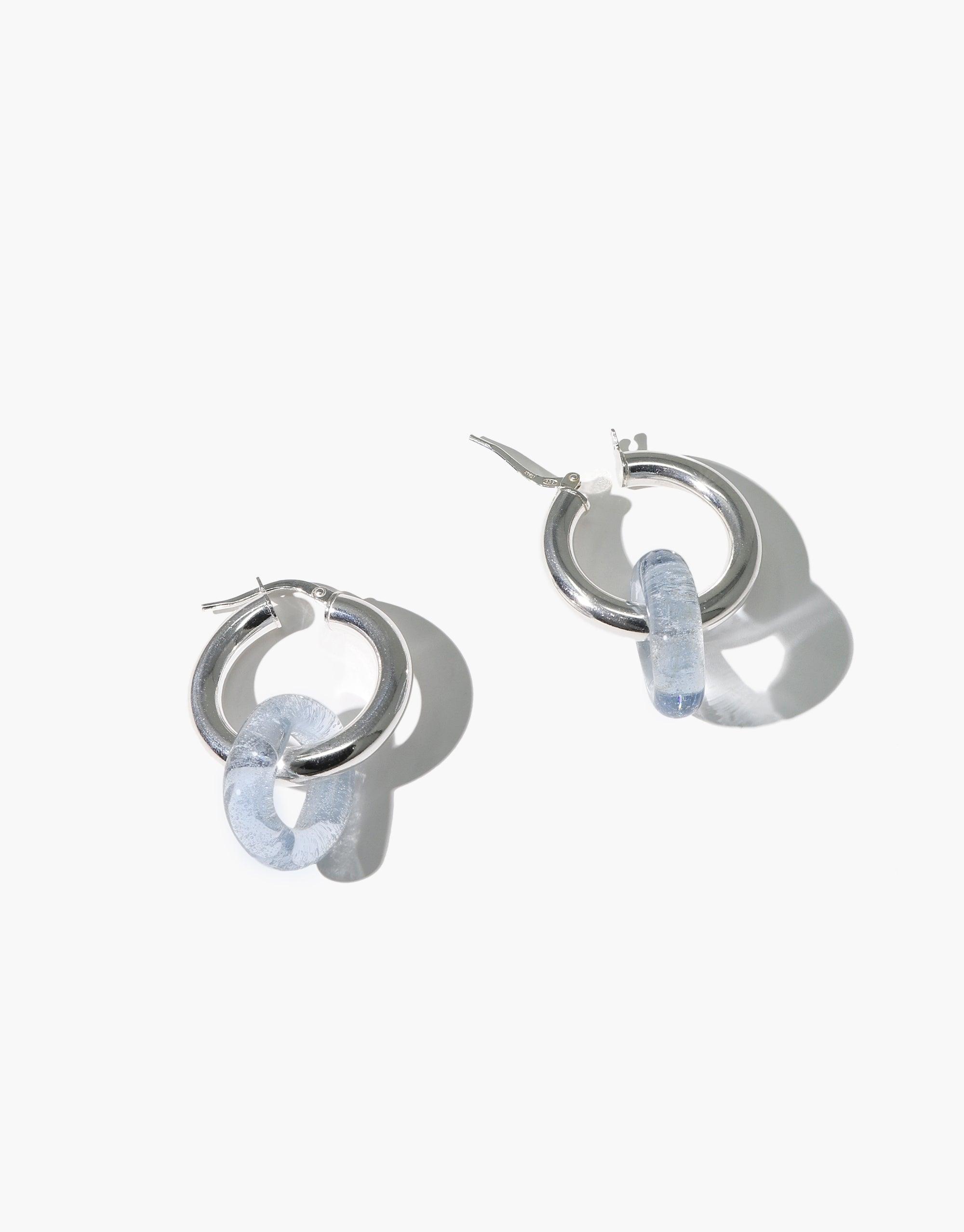 Large silver hoop earrings with light blue eco gem accents, featuring hollow tubing and CLED's signature small loop design. Sustainable jewelry handcrafted in Los Angeles. In The Loop Hoops | Large by CLED