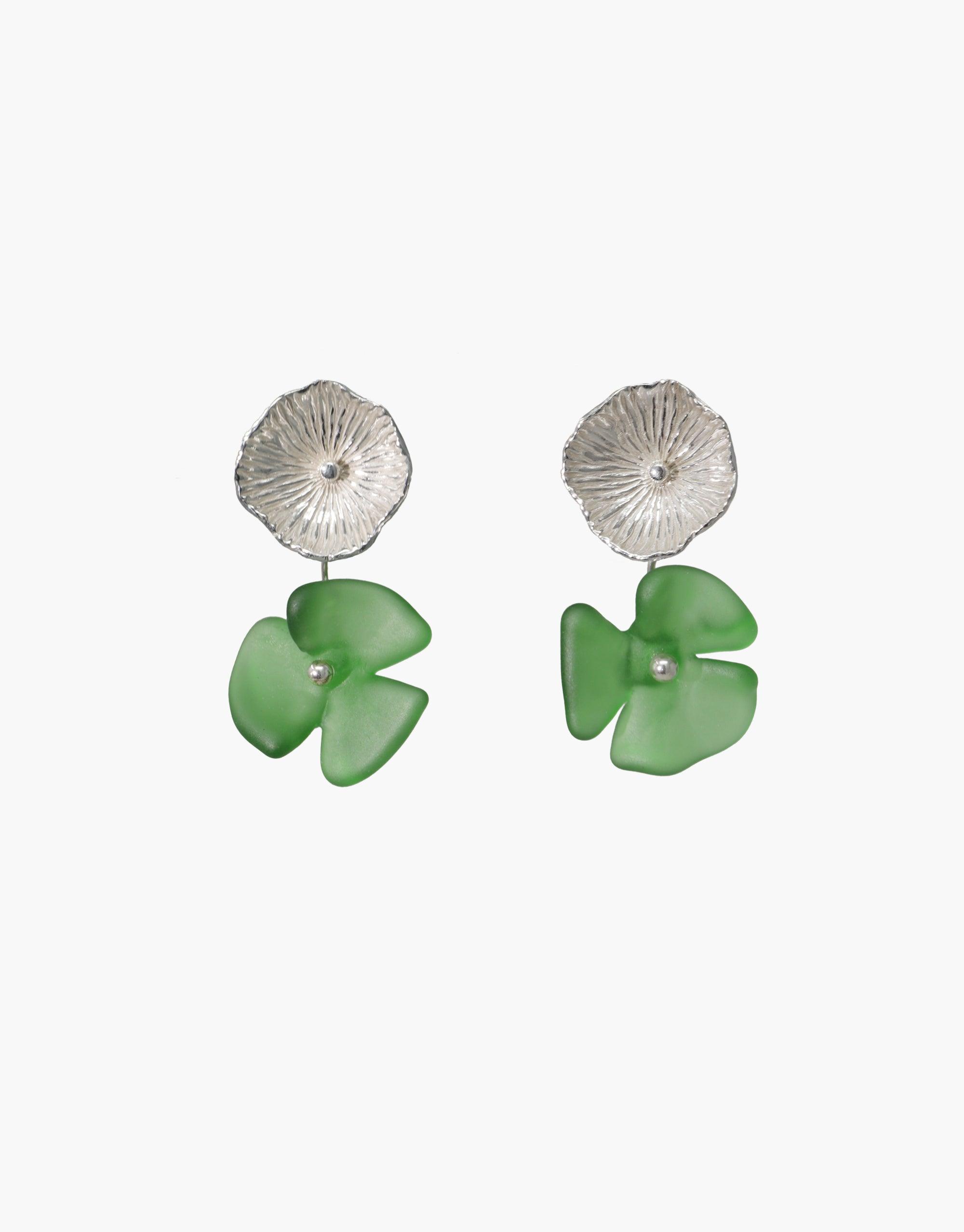 Elegant Periwinkle Single Earrings featuring textured silver discs with delicate green glass flower drops. Handcrafted eco-friendly jewelry showcasing upcycled materials. Stylish and sustainable accessory for nature-inspired fashion. CLED