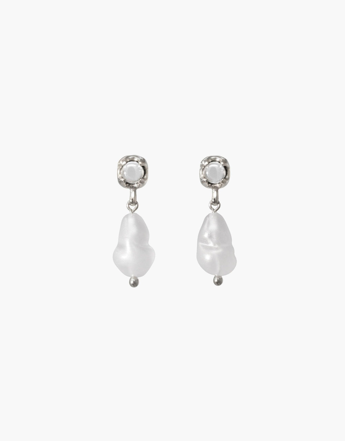 Elegant Beam Pearl Earrings featuring delicate pearl drops suspended from crystal-like studs. Handcrafted design showcasing sustainable materials and timeless beauty. Perfect for adding a touch of sophistication to any outfit. CLED Beam Pearl Earrings.