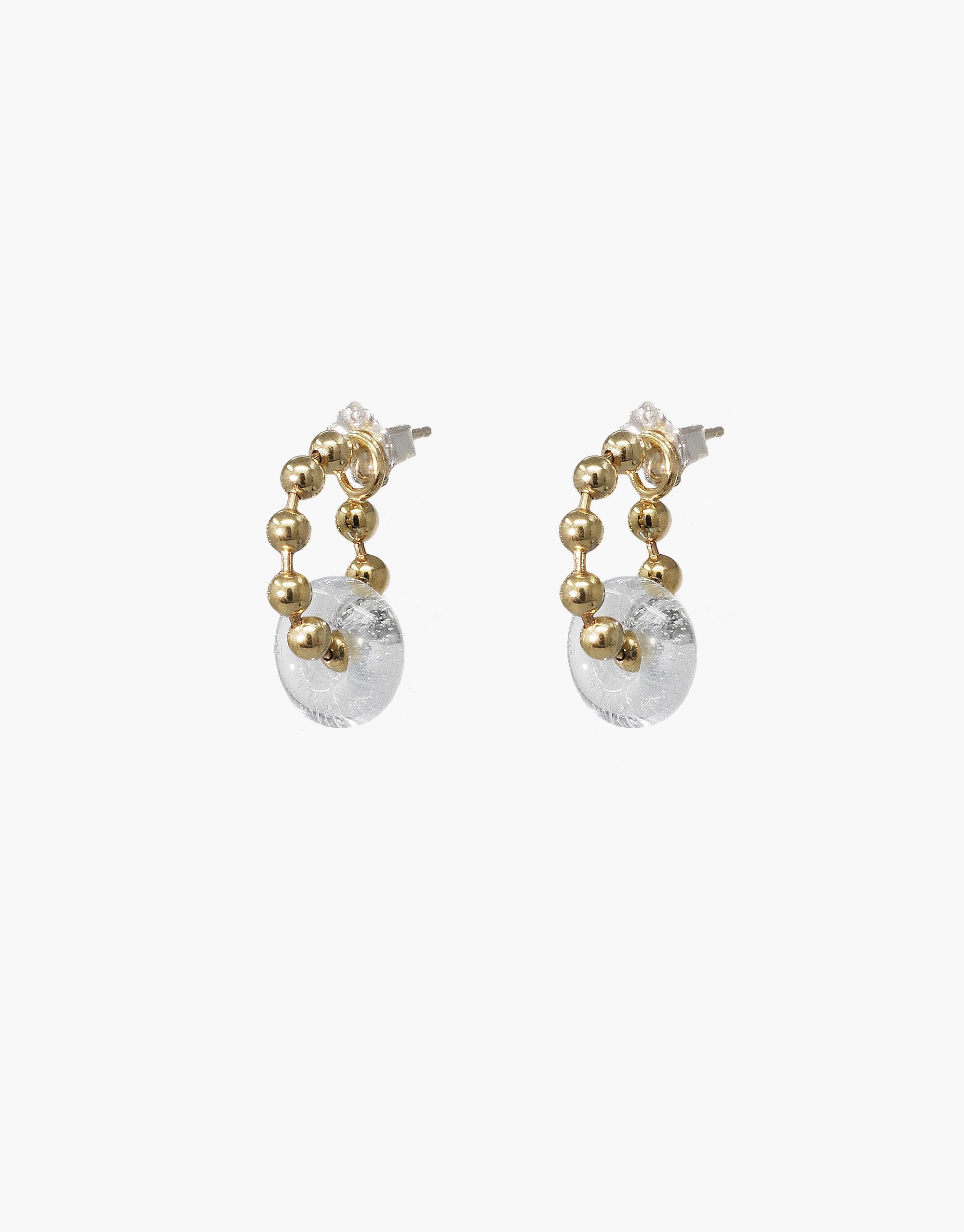 Elegant Donut Ball Hoop Earrings featuring gold-toned beaded hoops with transparent glass donuts, showcasing sustainable eco-friendly design and prismatic light effects. Handcrafted jewelry by CLED