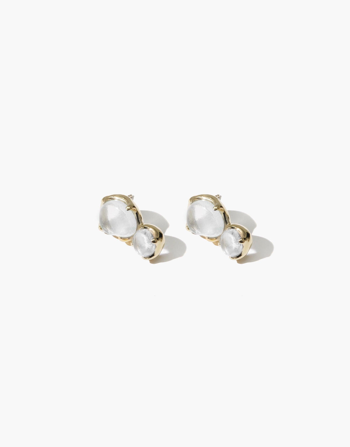 Elegant Duo Beam Earrings featuring two translucent eco gems in gold-toned settings, showcasing sustainable luxury and modern design. Handcrafted earrings capture light beautifully, reflecting CLED's commitment to eco-friendly jewelry. Duo Beam Earrings by CLED.