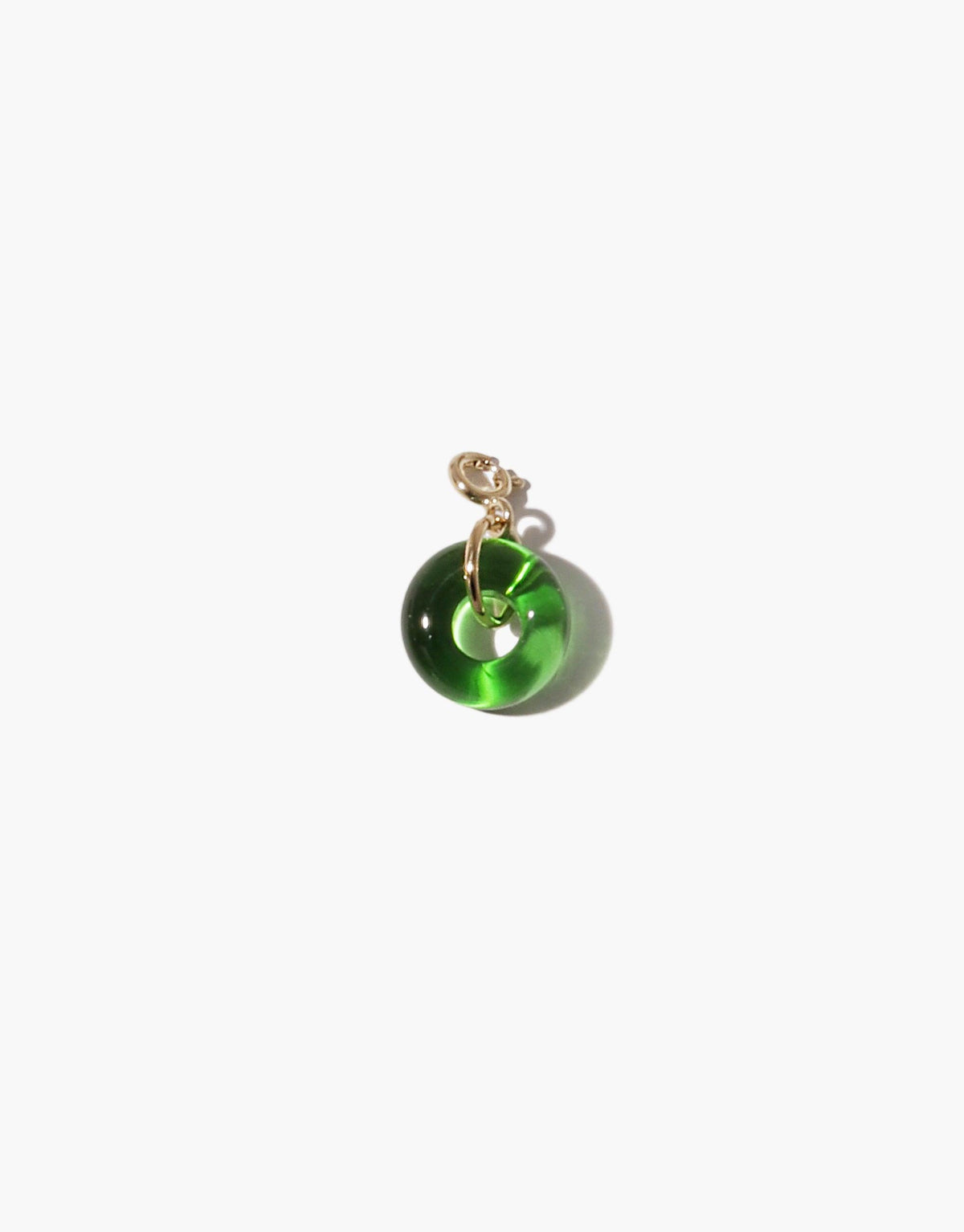 Handcrafted green glass donut charm with gold-toned clasp, part of the Icon Charm collection. Upcycled eco-friendly jewelry accessory for necklaces or bracelets. Donut | Icon Charm by CLED