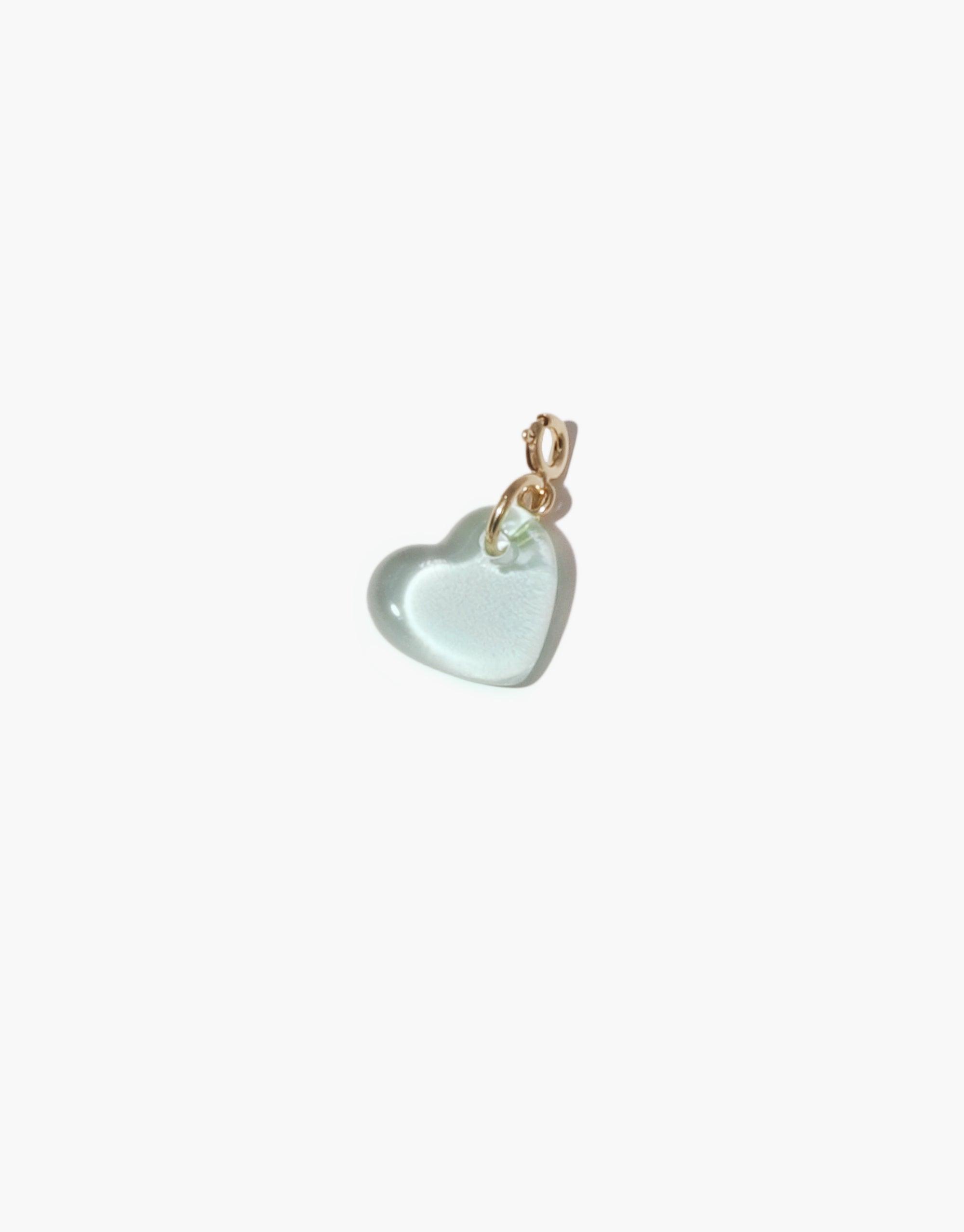 Delicate heart-shaped charm in pale blue glass with gold vermeil attachment, handcrafted from upcycled eco glass. Heart | Icon Charm by CLED