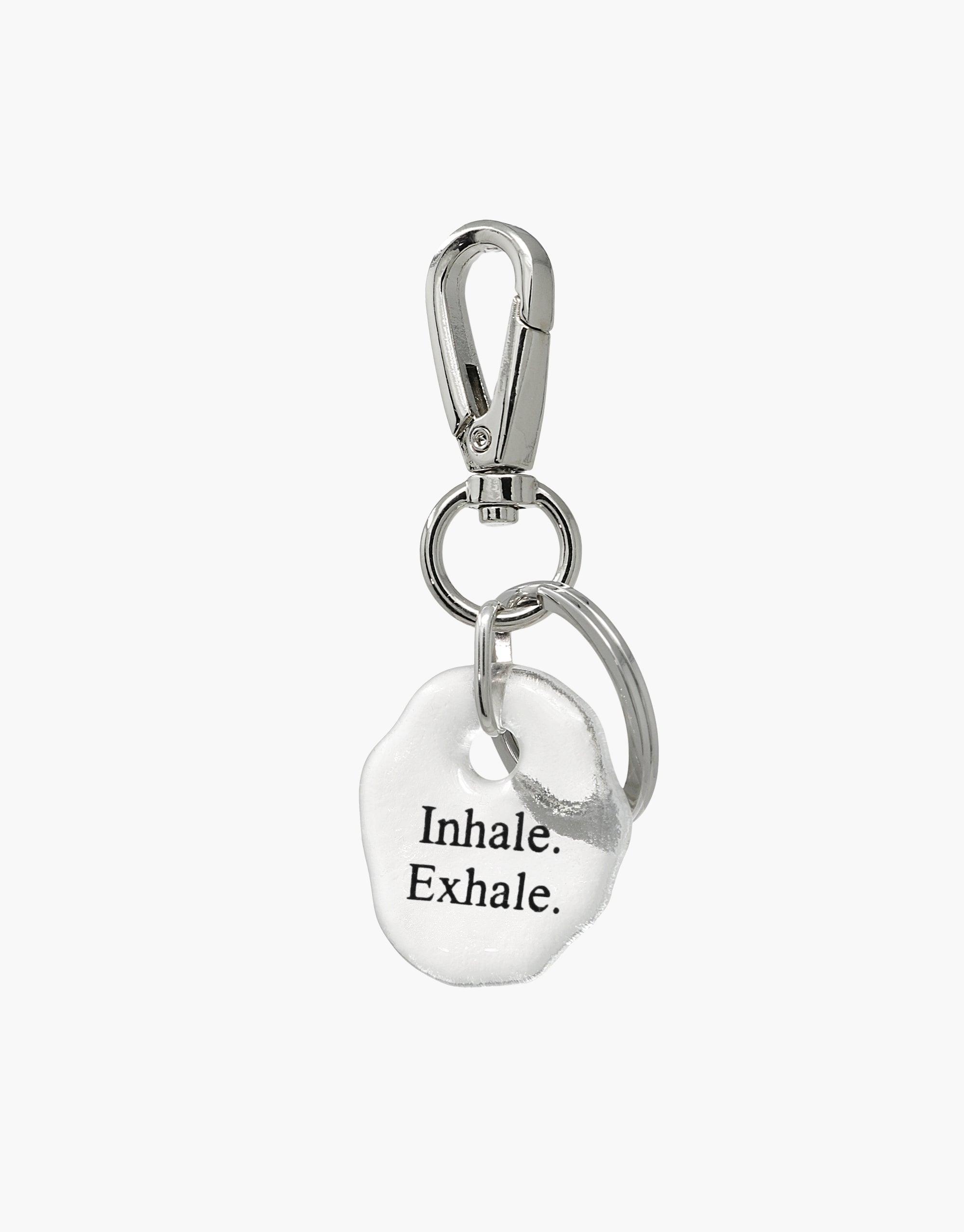 Messenger Keyring with silver hook clasp and clear glass charm engraved with "Inhale. Exhale." message, showcasing eco-friendly design and mindfulness inspiration. Handcrafted accessory for daily reminders and connection. Messenger Keyring | Inhale. Exhale. CLED