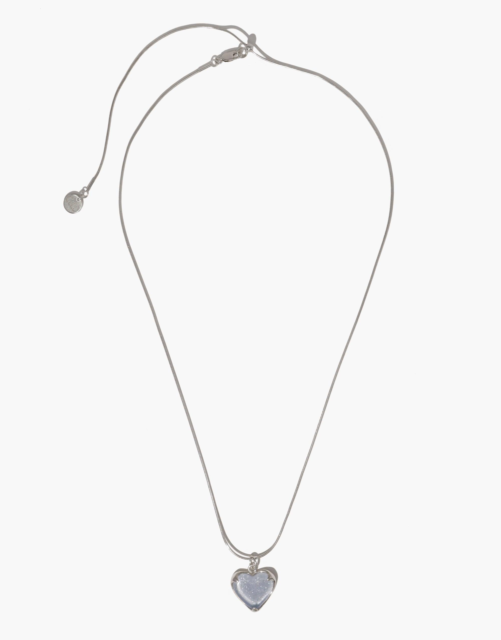 Elegant Heart Frame Long Necklace featuring adjustable sterling silver chain and upcycled glass heart pendant. Handmade eco-friendly jewelry with delicate charm design. Perfect for sustainable fashion lovers. CLED Heart Frame Long Necklace.