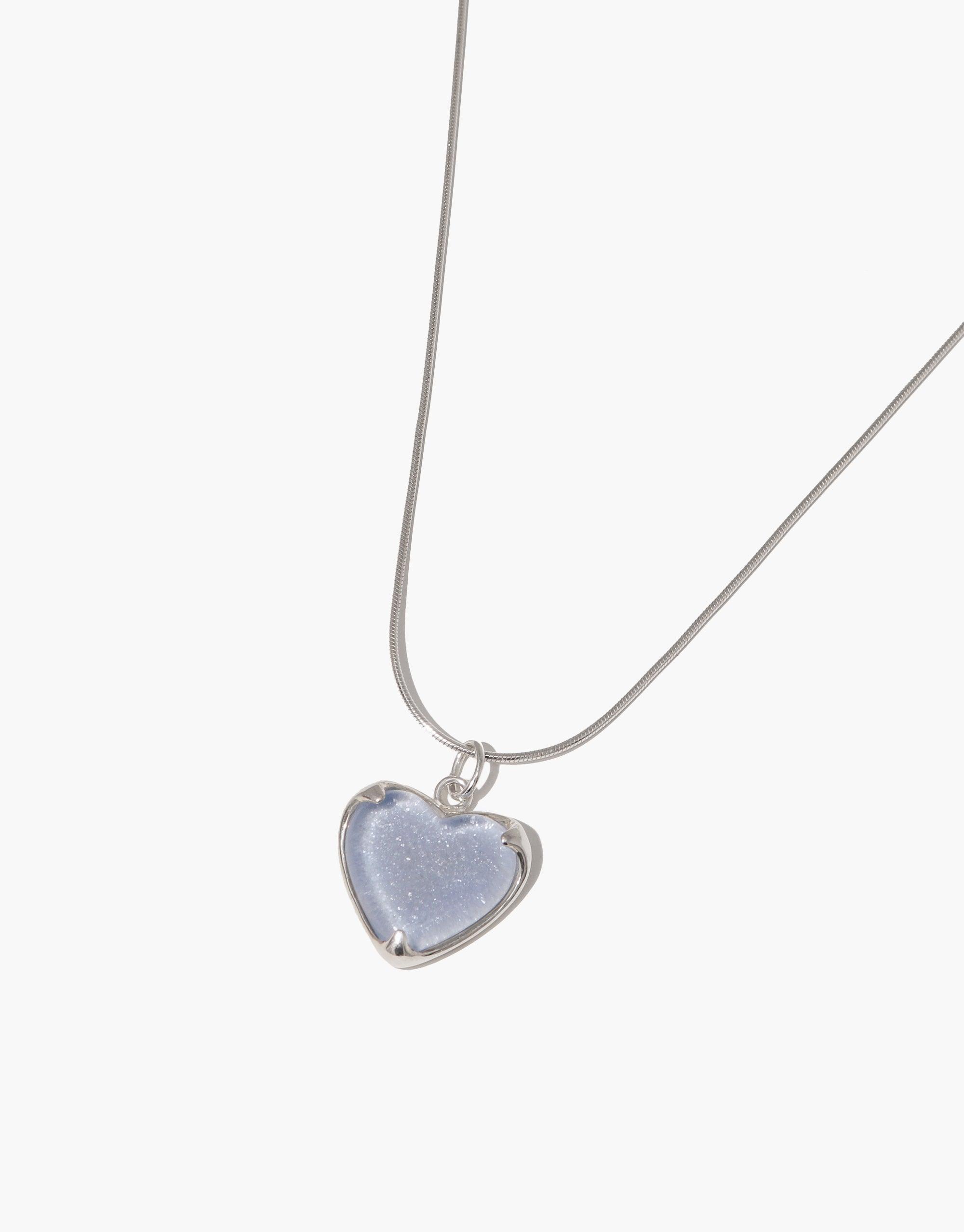Heart Frame Long Necklace featuring a delicate silver chain with a light blue heart-shaped pendant made from upcycled glass. Adjustable length, handcrafted eco-friendly jewelry. CLED