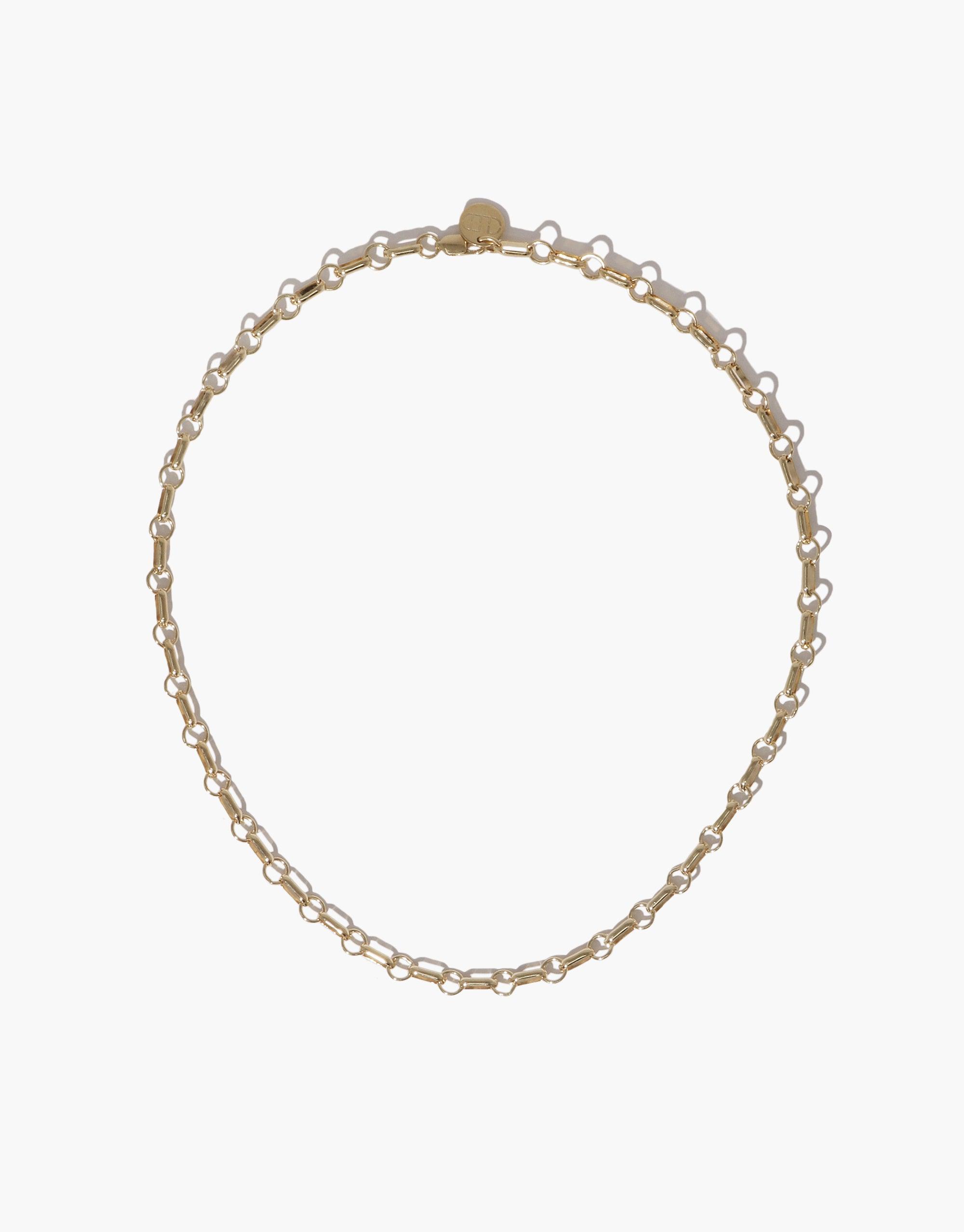Elegant gold-tone chain necklace with delicate links, perfect for customizing with charms or wearing alone for a minimalist look. Versatile and stylish Icon Chain Necklace | A, ideal for creating unique personal style. CLED